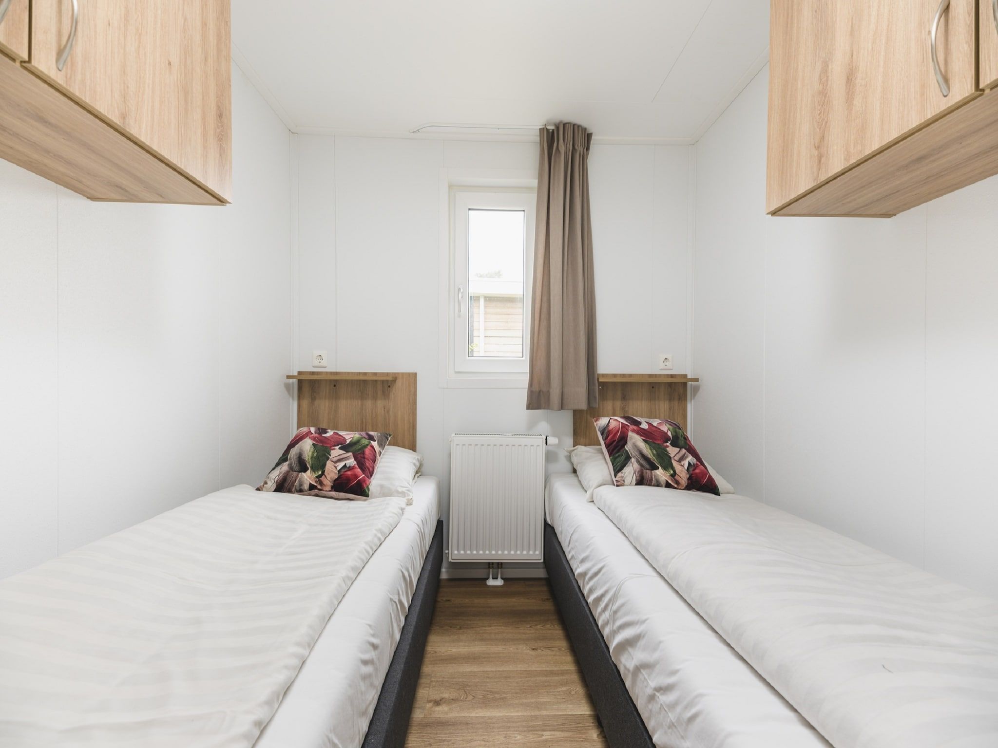 Een slaapkamer van Vakantiepark Mölke 29 in Zuna
