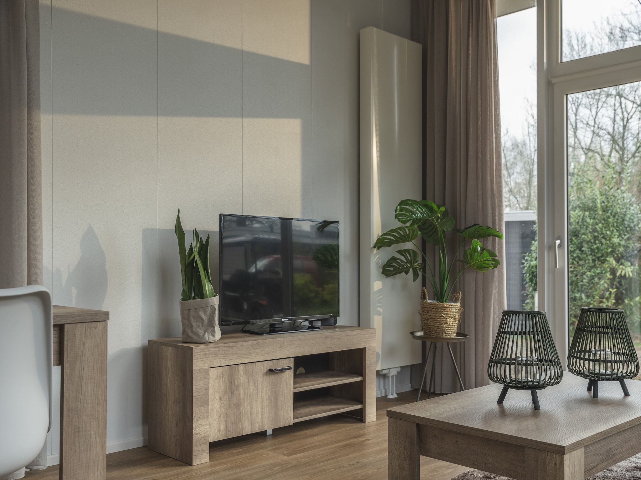 De woonkamer van Vakantiepark Mölke 29 in Zuna