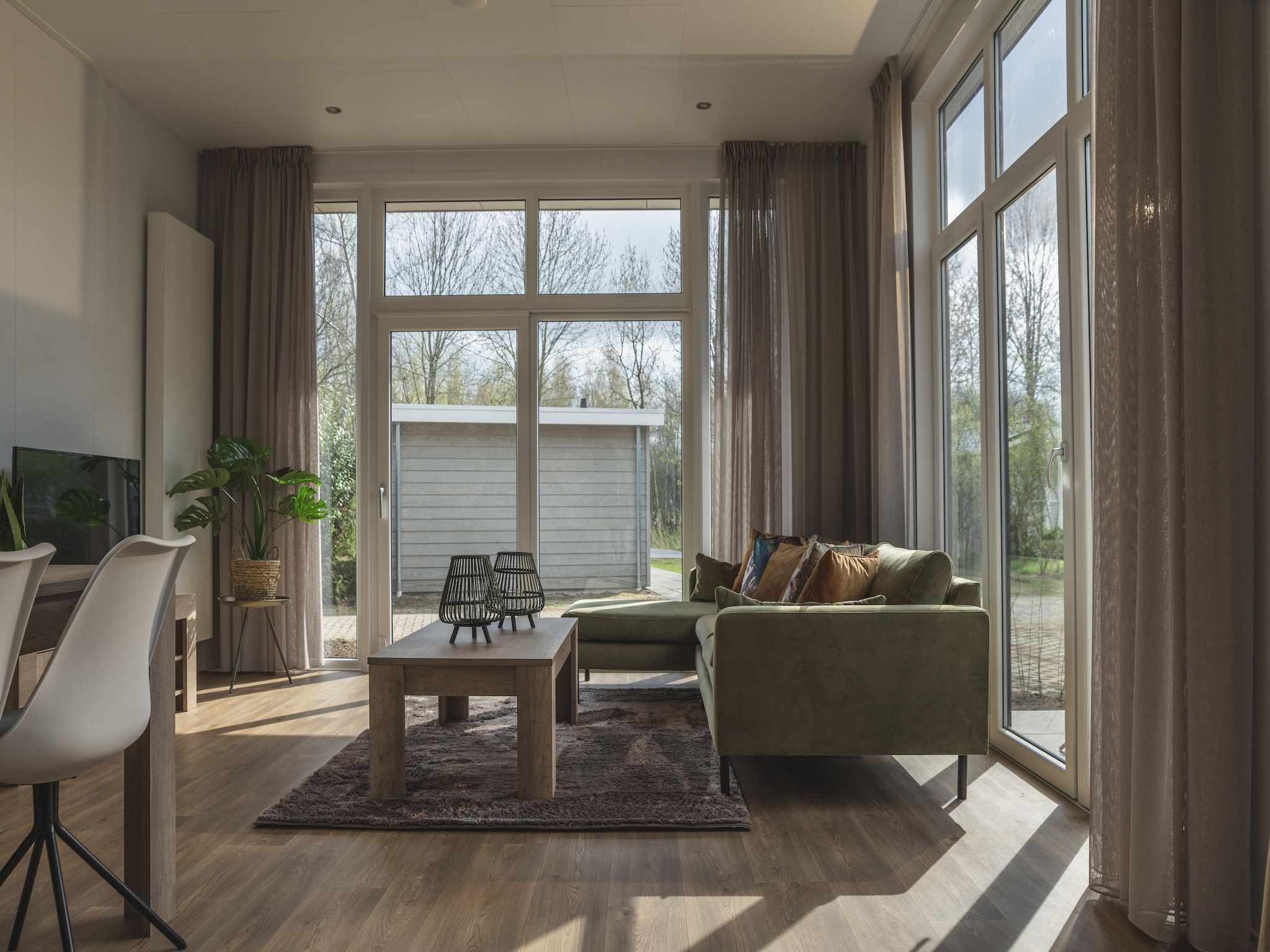 De woonkamer van Vakantiepark Mölke 29 in Zuna