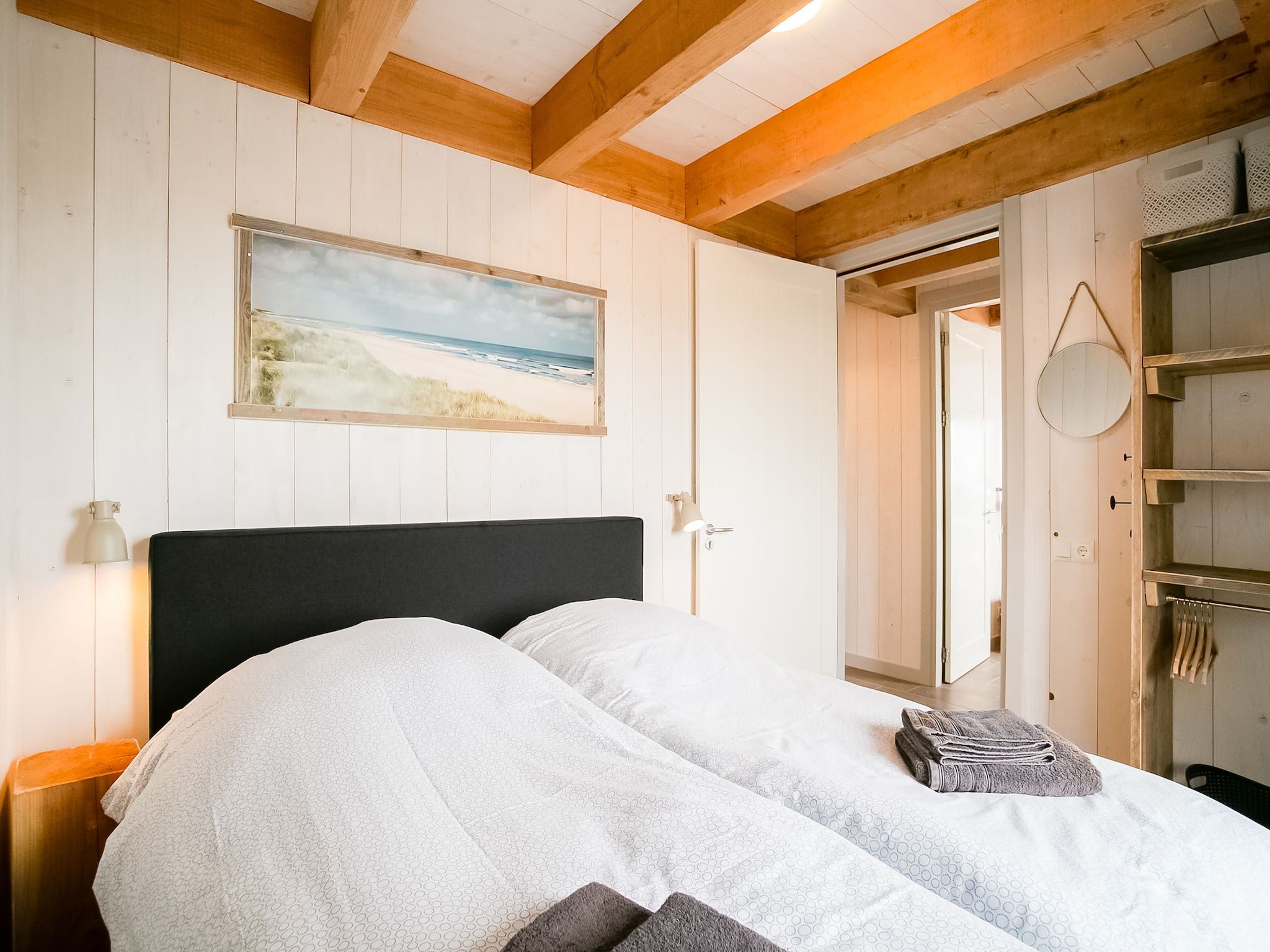 Een slaapkamer van Hazenborgh - Duinhuis 2 in Callantsoog