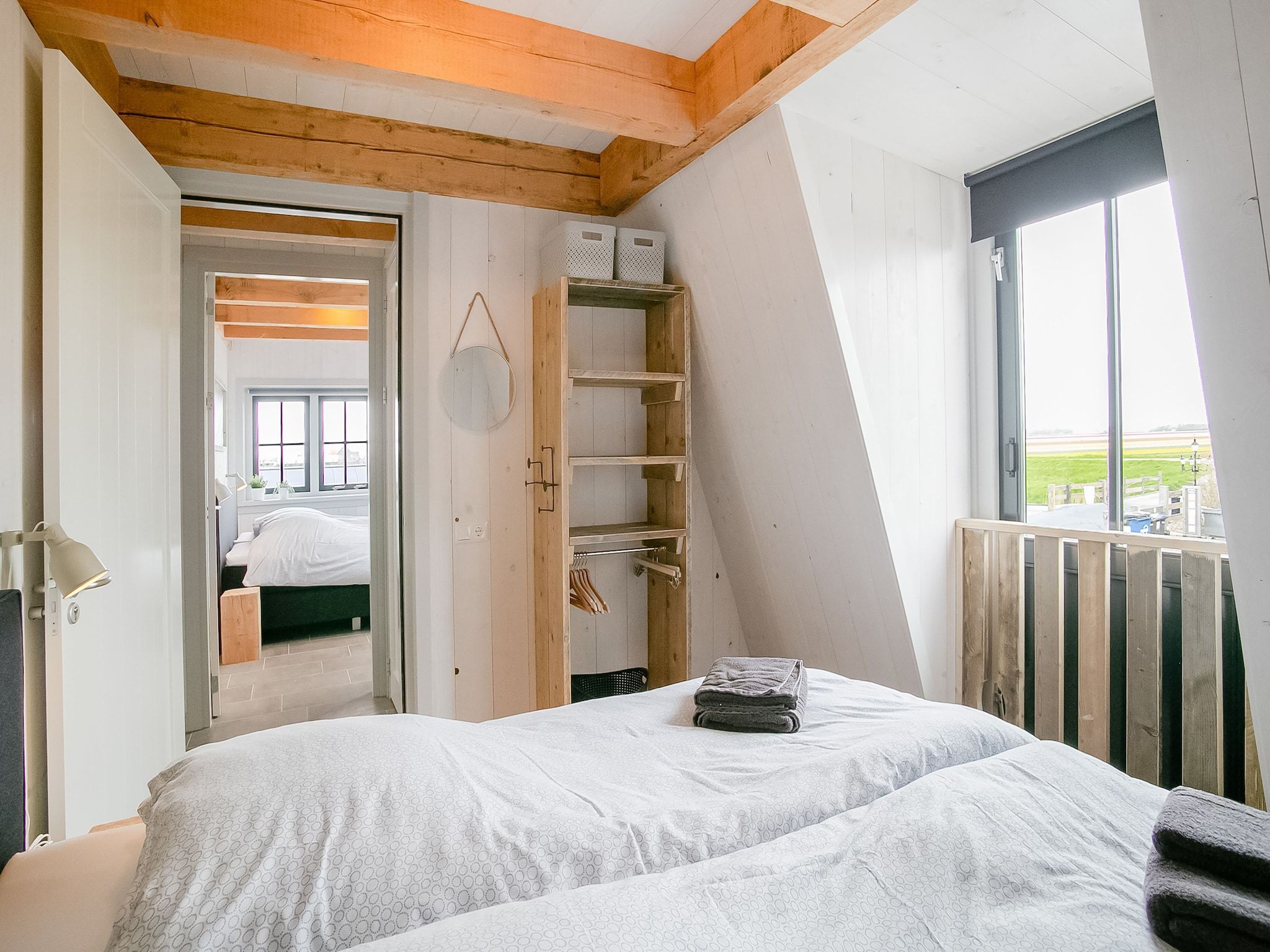 Een slaapkamer van Hazenborgh - Duinhuis 2 in Callantsoog