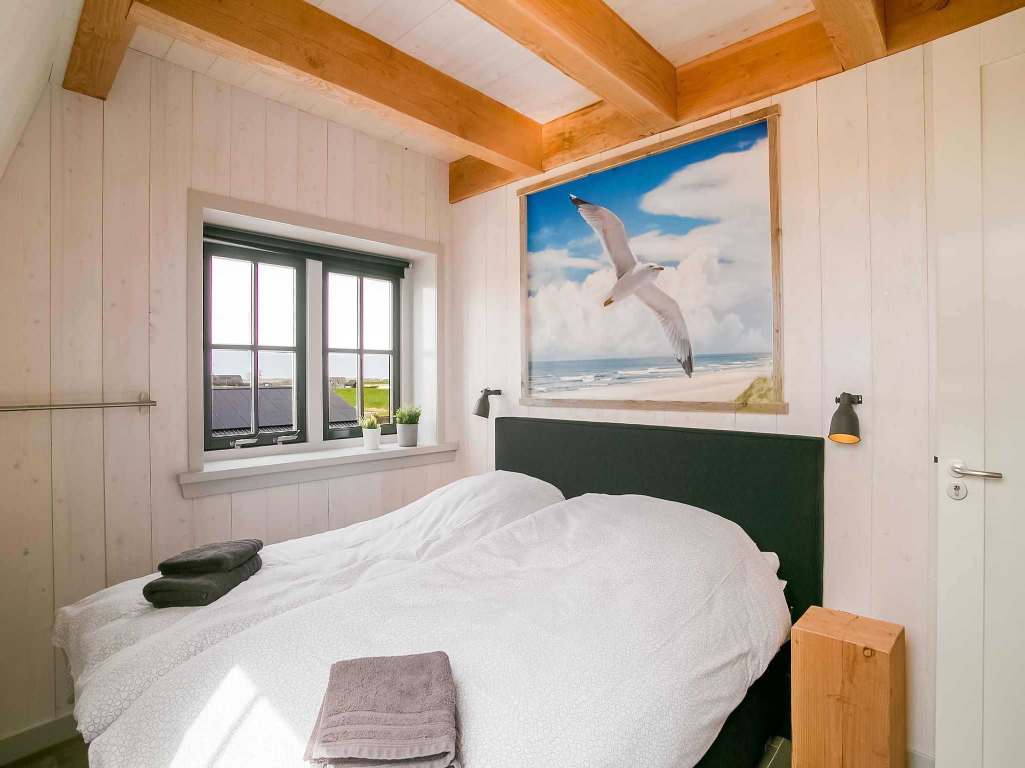 Een slaapkamer van Hazenborgh - Duinhuis 2 in Callantsoog