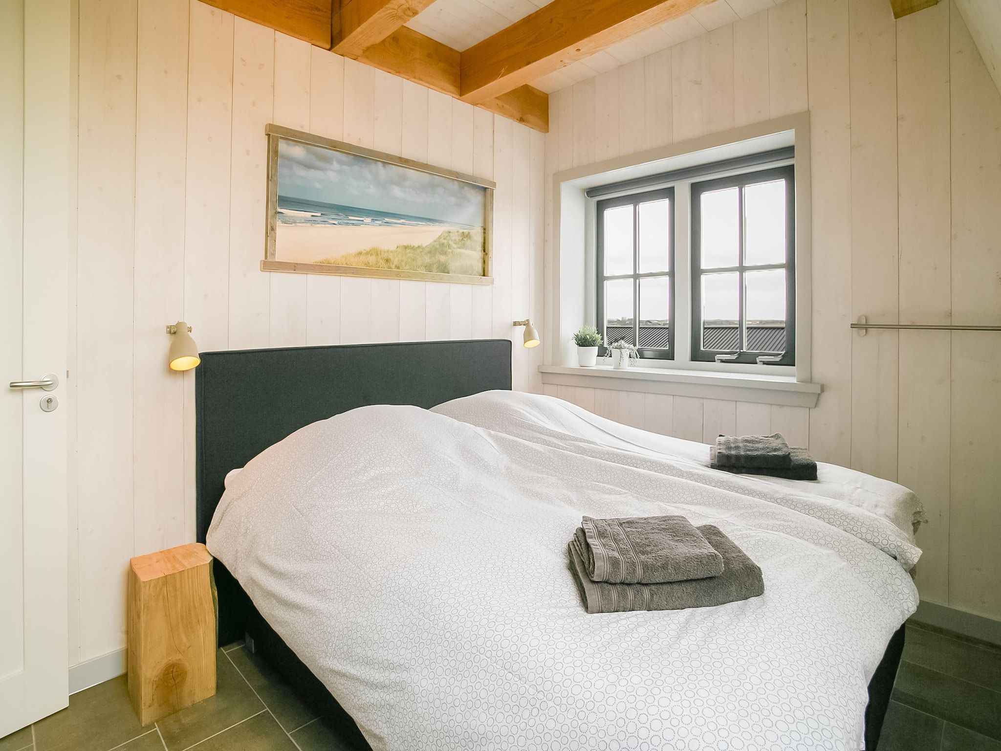 Een slaapkamer van Hazenborgh - Duinhuis 2 in Callantsoog