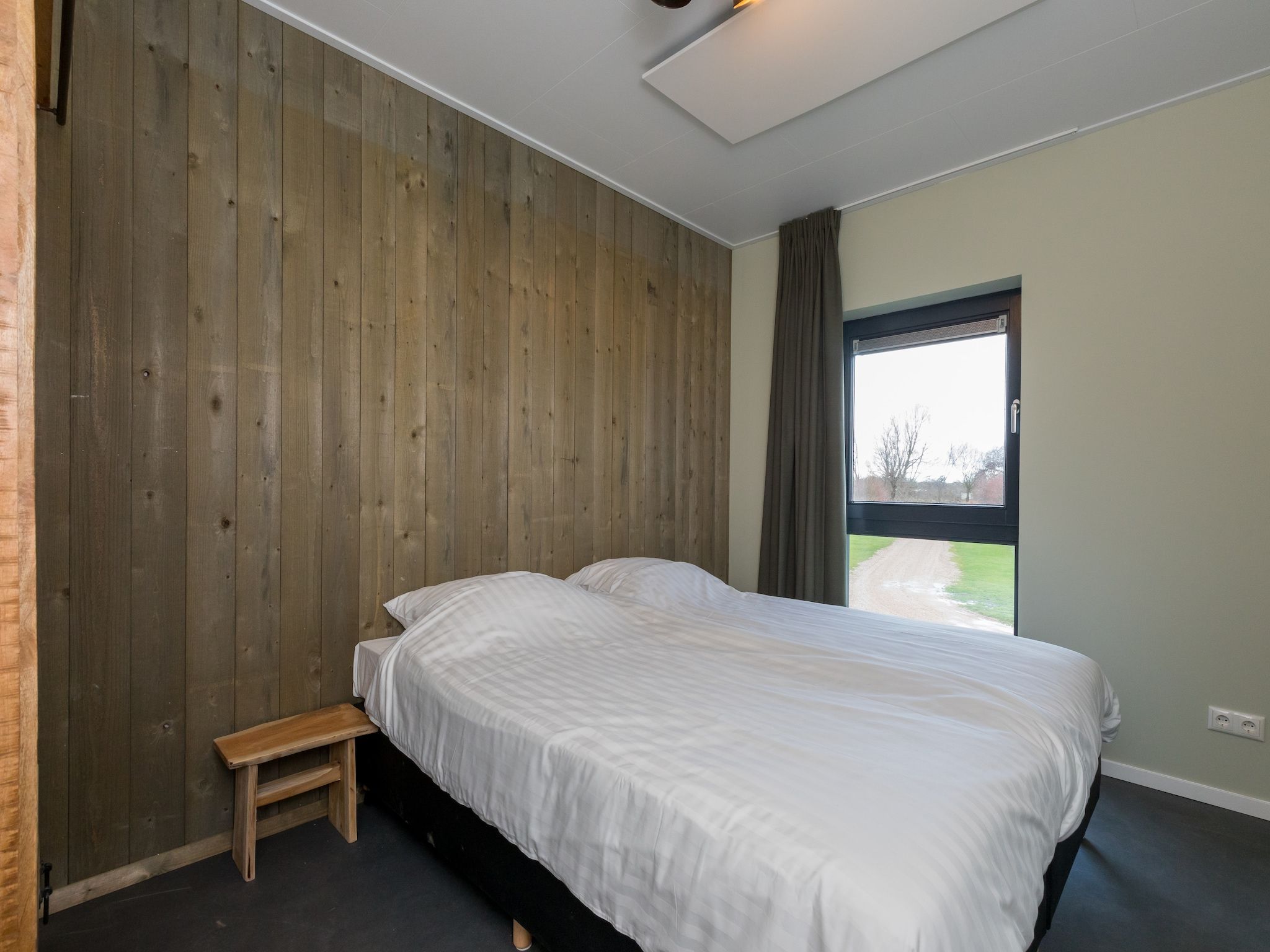 Een slaapkamer van Vroondijk 2-Zeebloesempje in Vrouwenpolder