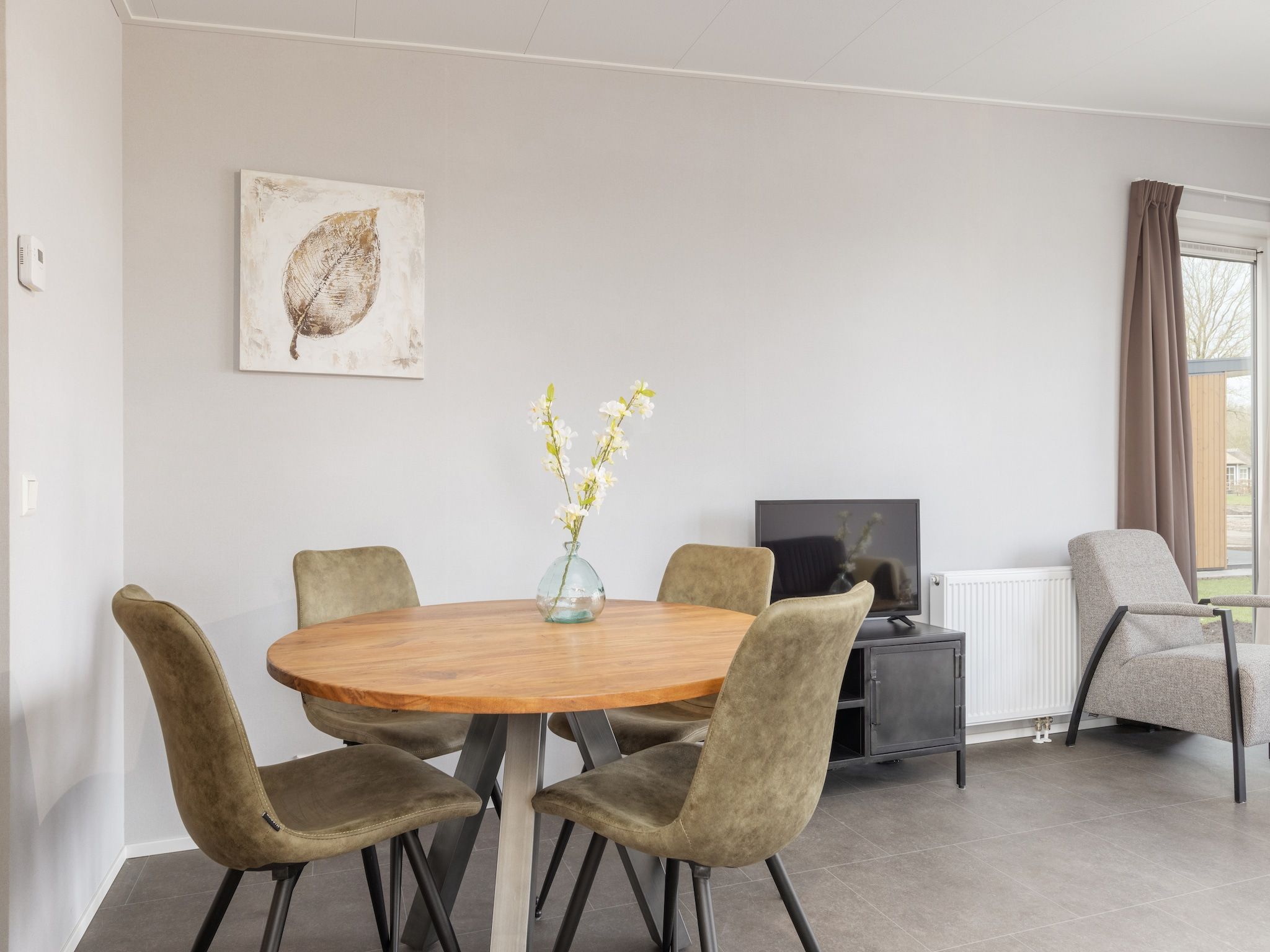 De woonkamer van Recreatiepark Tolplas 17 in Hoge Hexel