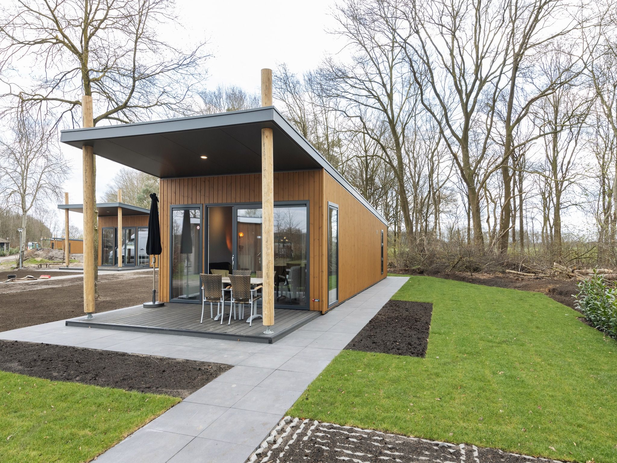 De tuin van Recreatiepark Tolplas 17 in Hoge Hexel