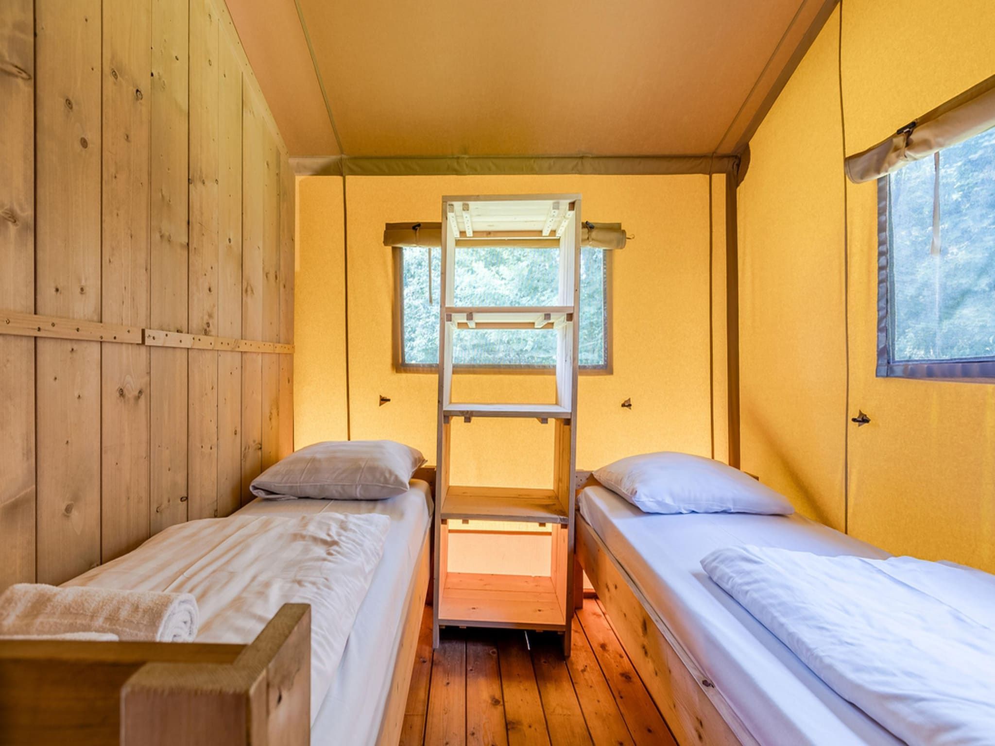 Een slaapkamer van Vakantiepark de Katjeskelder 19 in Oosterhout