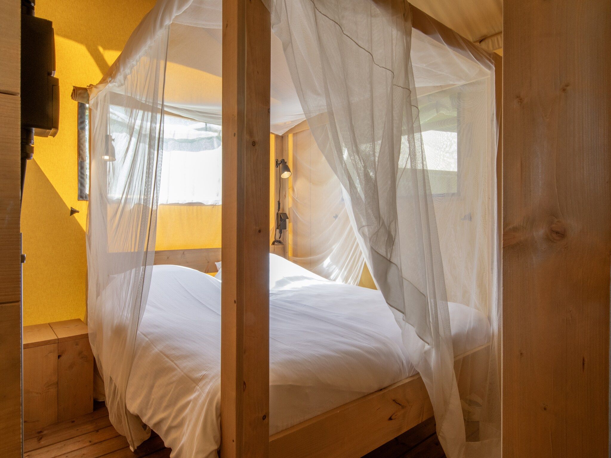 Een slaapkamer van Vakantiepark Klein Vink 19 in Arcen