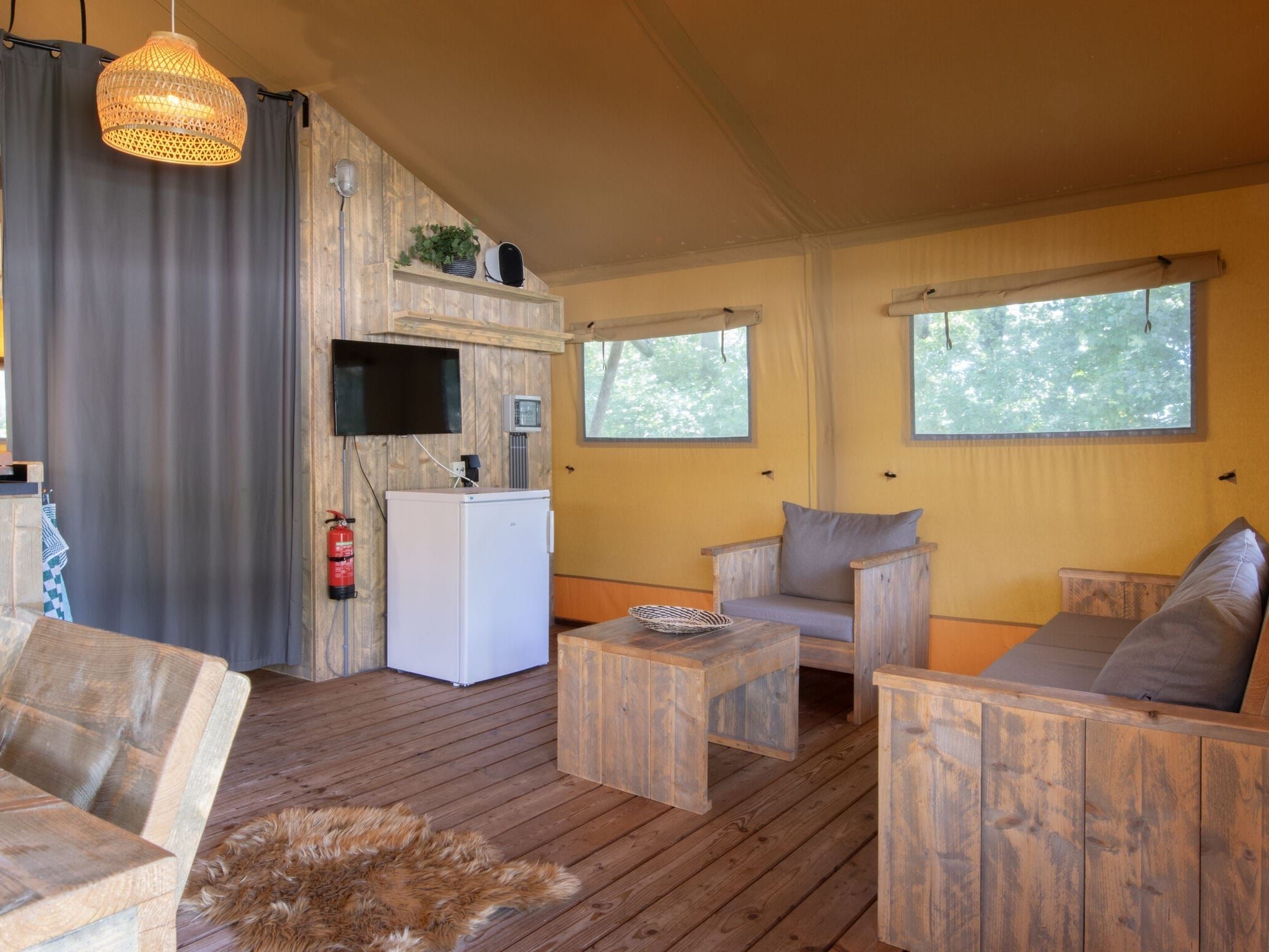 De woonkamer van Vakantiepark Klein Vink 21 in Arcen