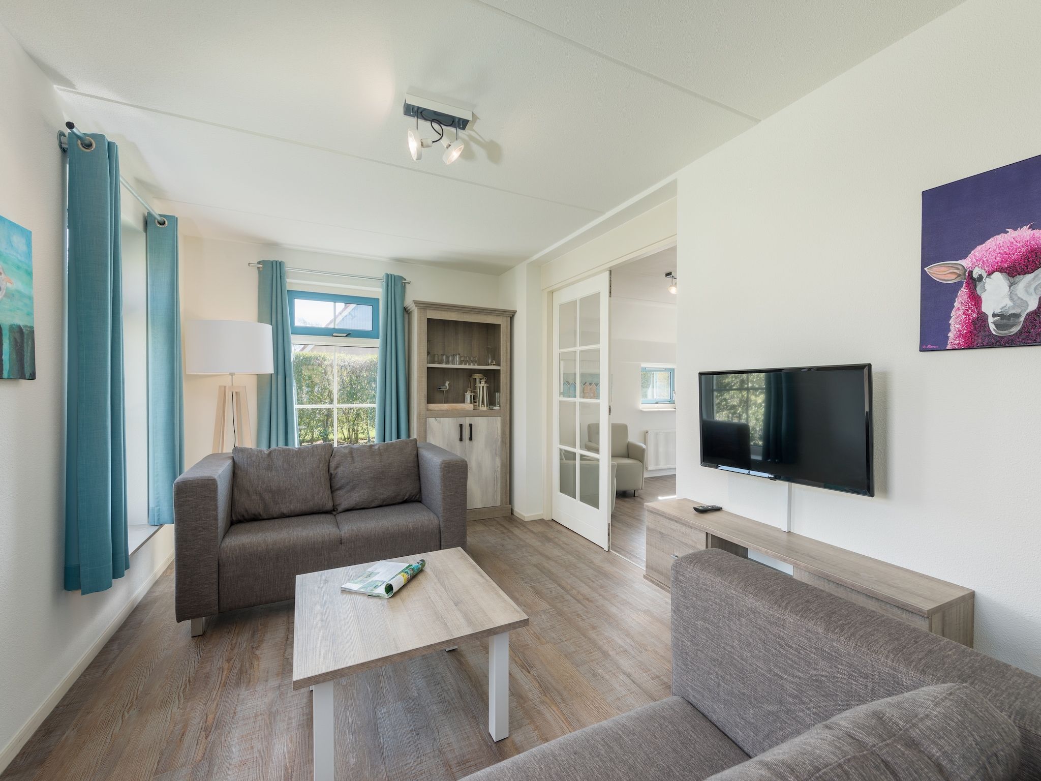 De woonkamer van Kustpark Texel 14 in De Koog