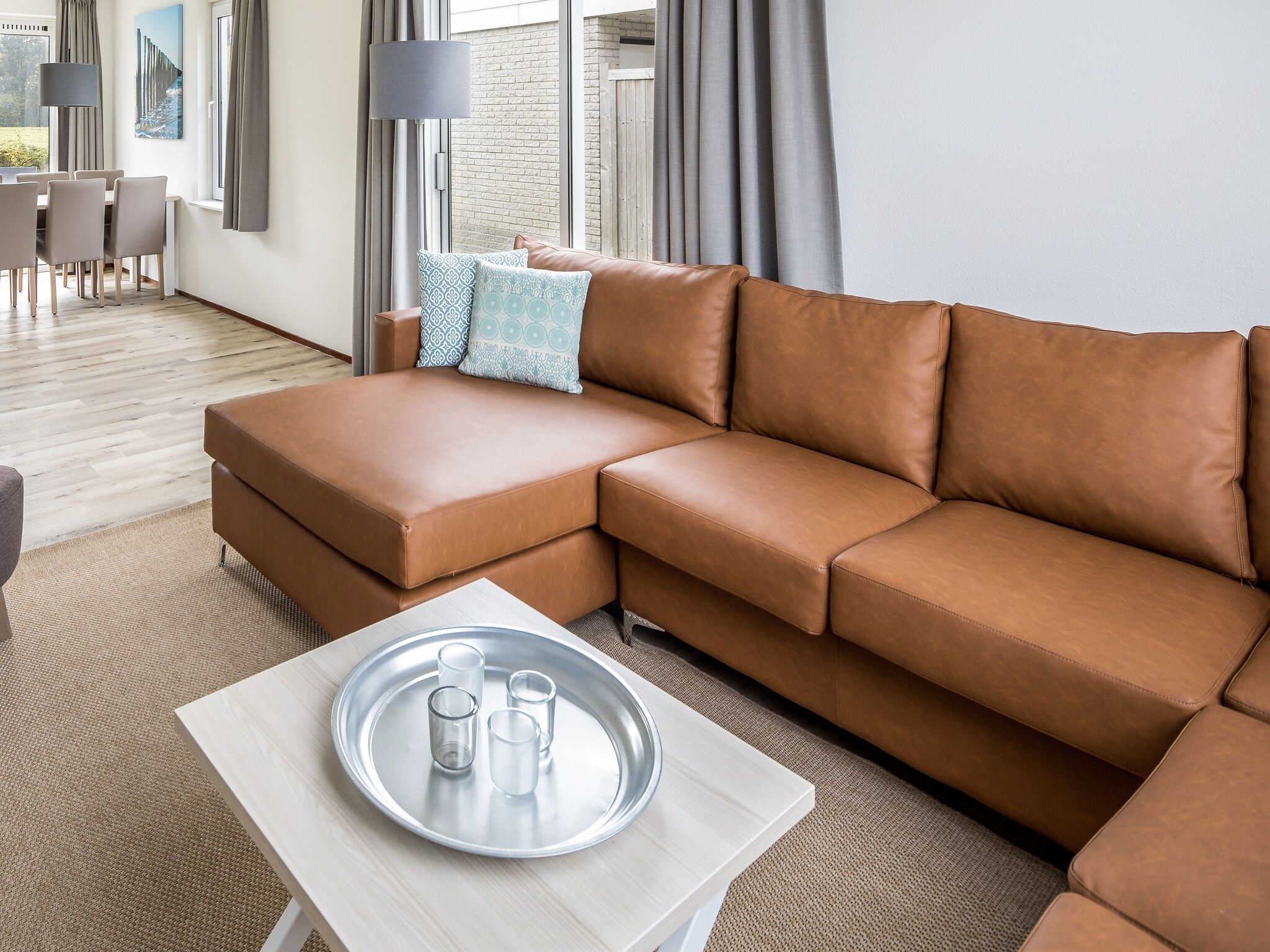 De woonkamer van Vakantiepark Zeeland Village 2 in Scharendijke