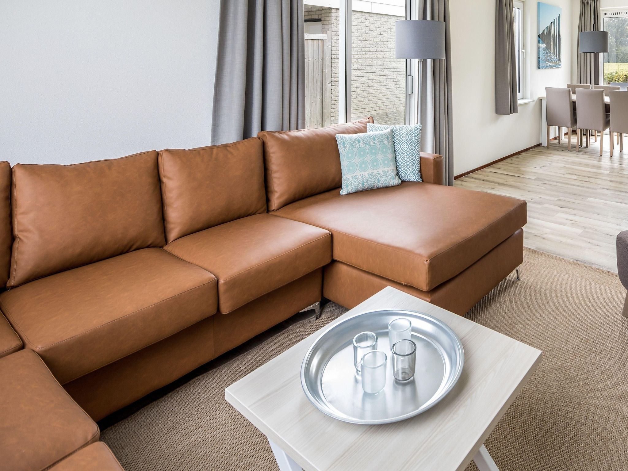 De woonkamer van Vakantiepark Zeeland Village 2 in Scharendijke