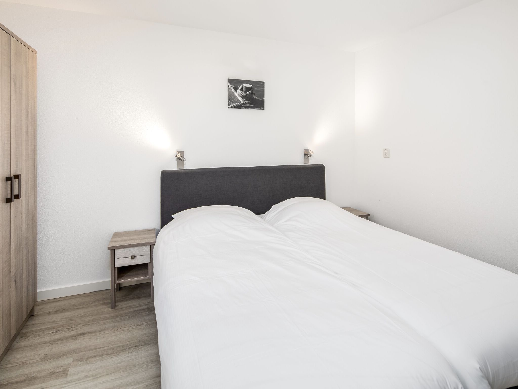 Een slaapkamer van Vakantiepark Bos en Duin 1 in Oostkapelle