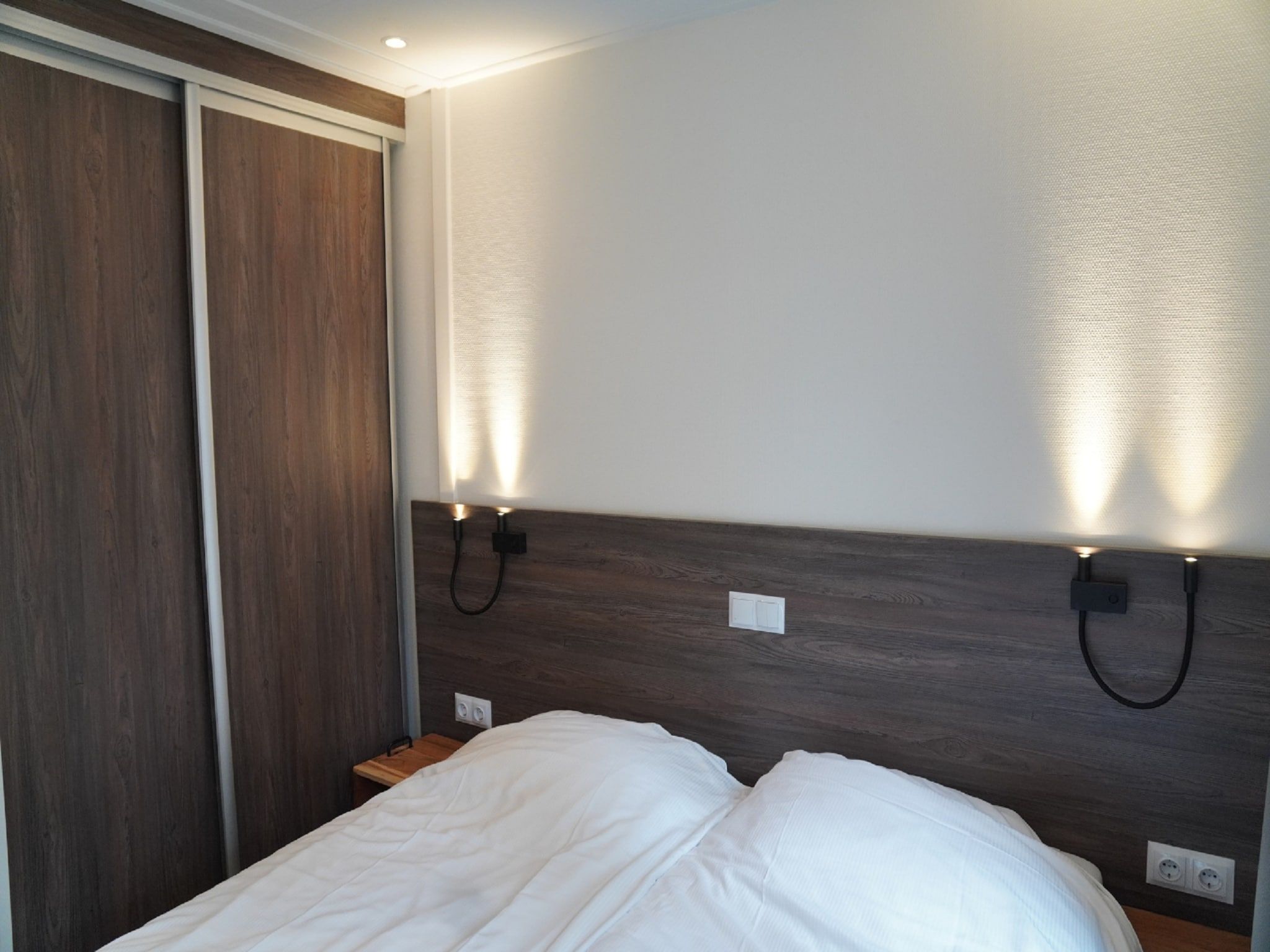 Een slaapkamer van Vakantiepark De Rimboe & De Woeste Hoogte 20 in Hoenderloo