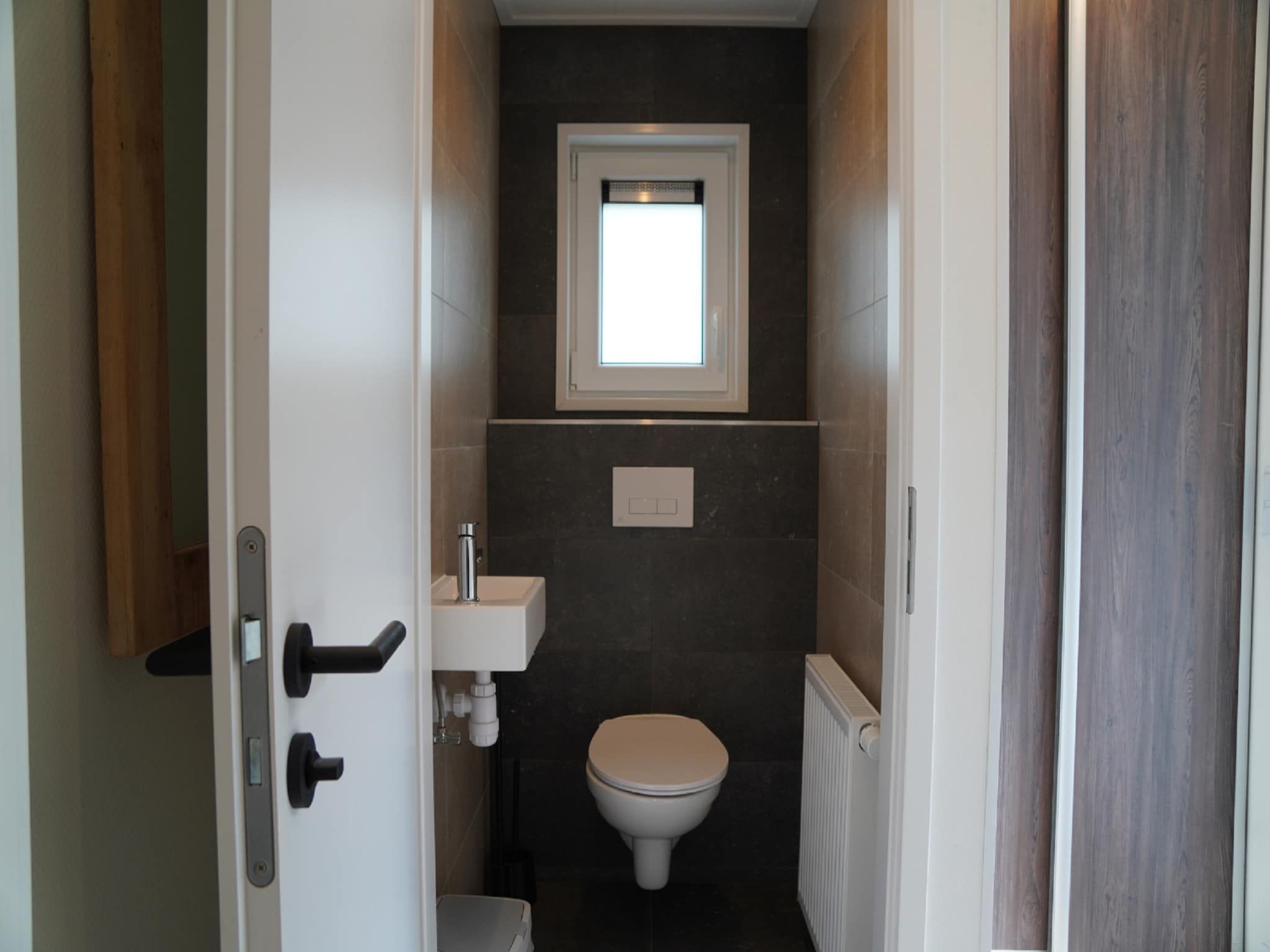 De badkamer van Vakantiepark De Rimboe & De Woeste Hoogte 20 in Hoenderloo