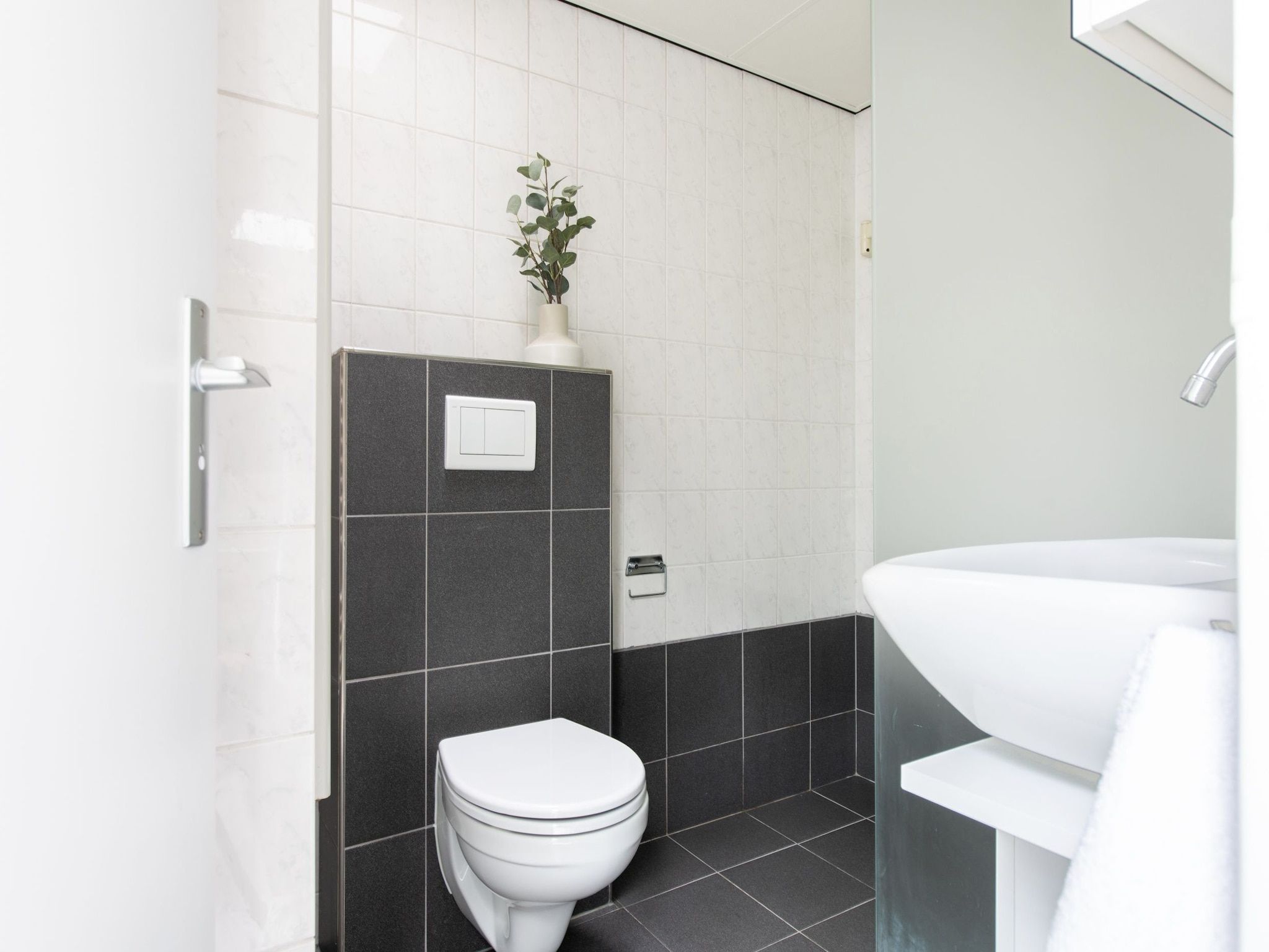 De badkamer van Vakantiepark de Berkenhorst 10 in Kootwijk