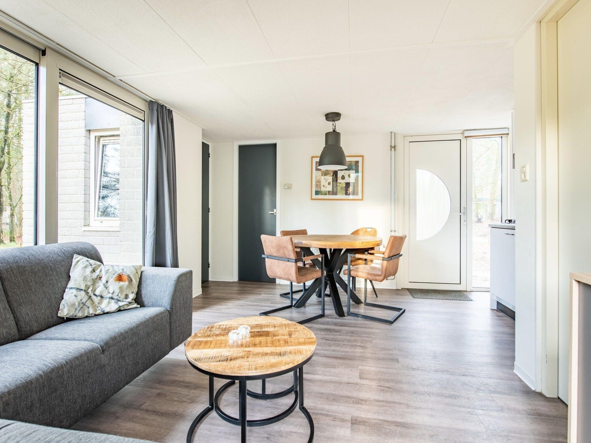 De woonkamer van Vakantiepark de Berkenhorst 11 in Kootwijk