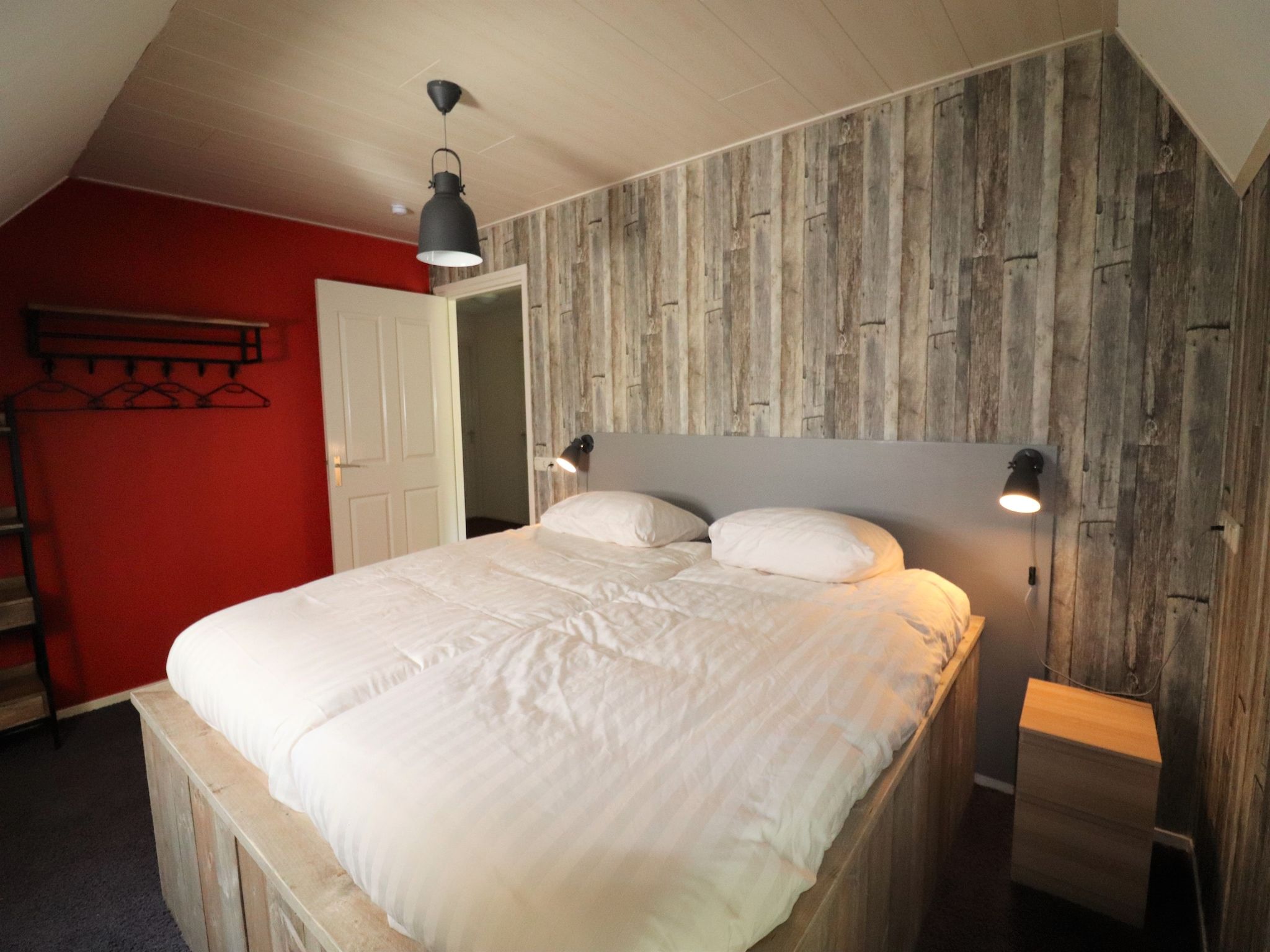 Een slaapkamer van Woonboerderij Bij Erve Mulder in Dalerveen