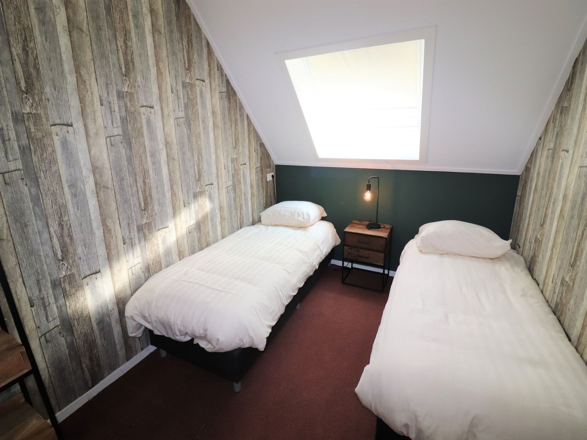 Een slaapkamer van Woonboerderij Bij Erve Mulder in Dalerveen