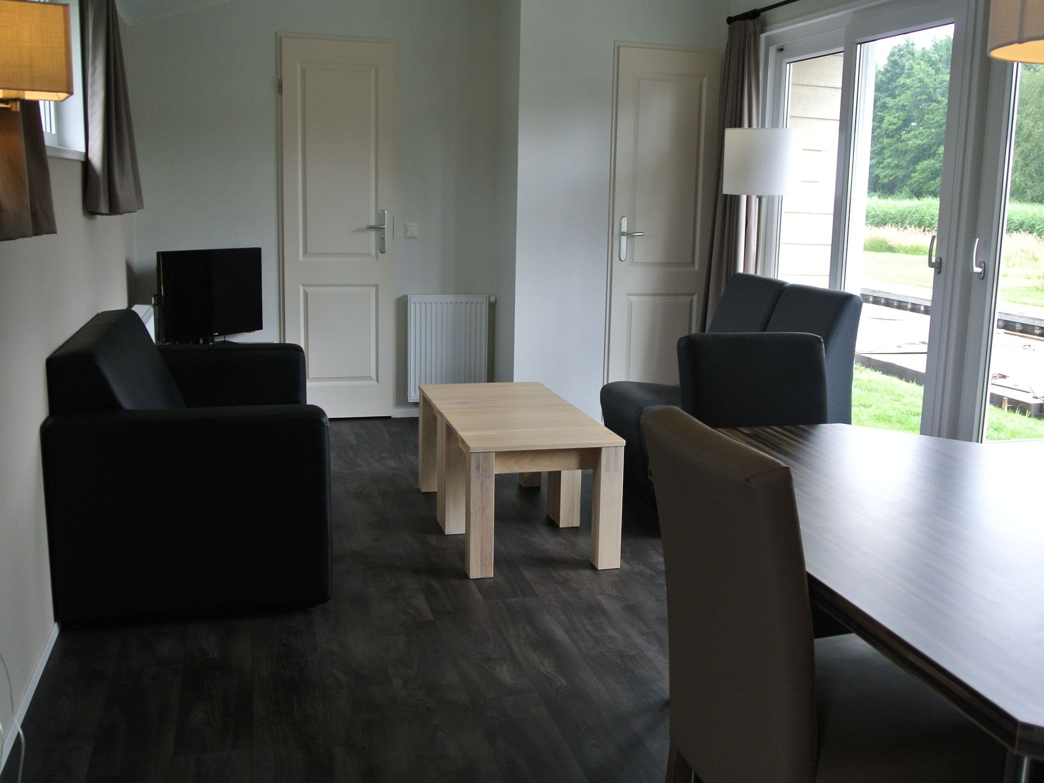 De woonkamer van Vakantiepark Giethoorn 7 in Giethoorn