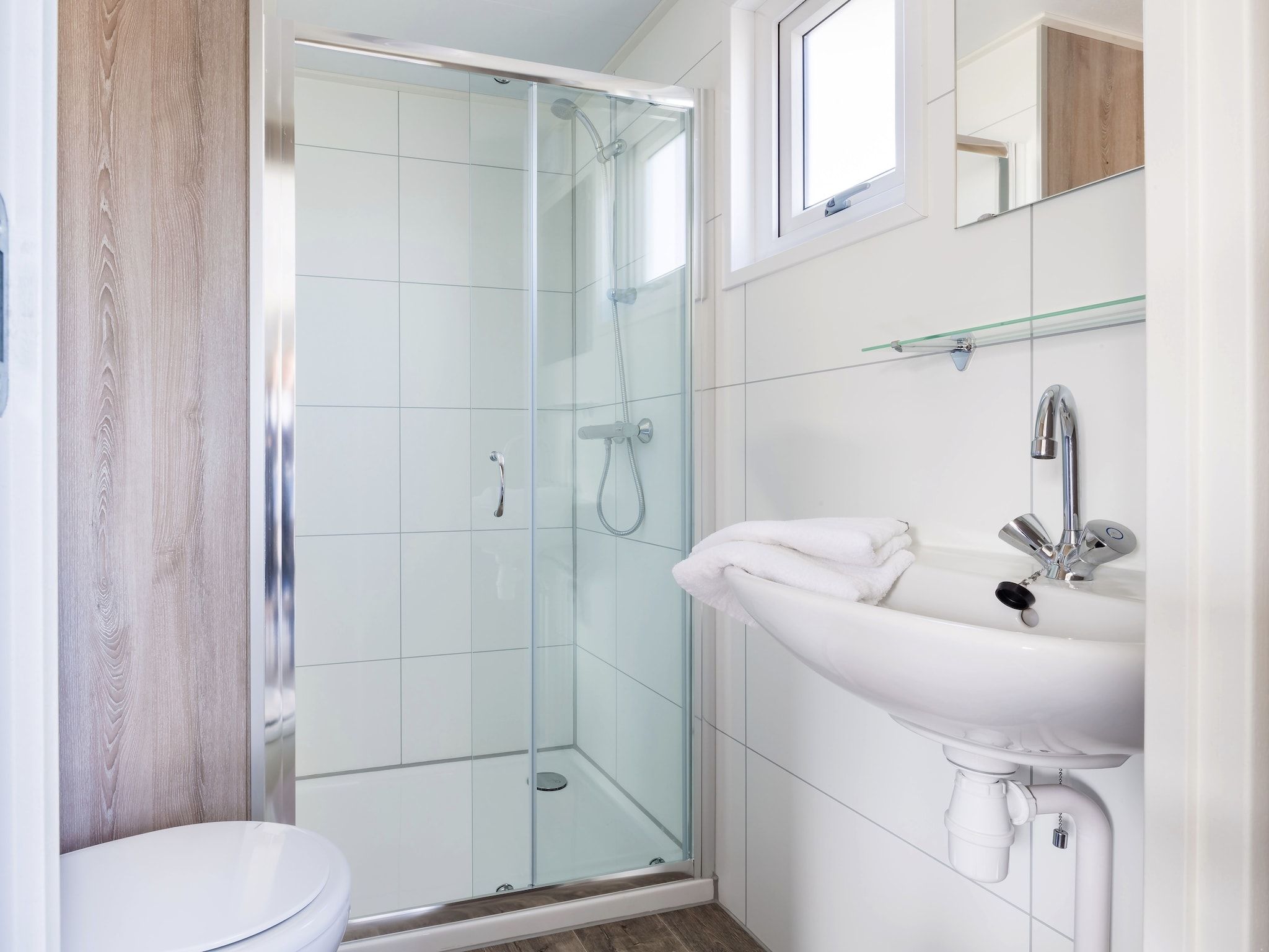 De badkamer van Vakantiepark Beach Resort 22 in Kamperland