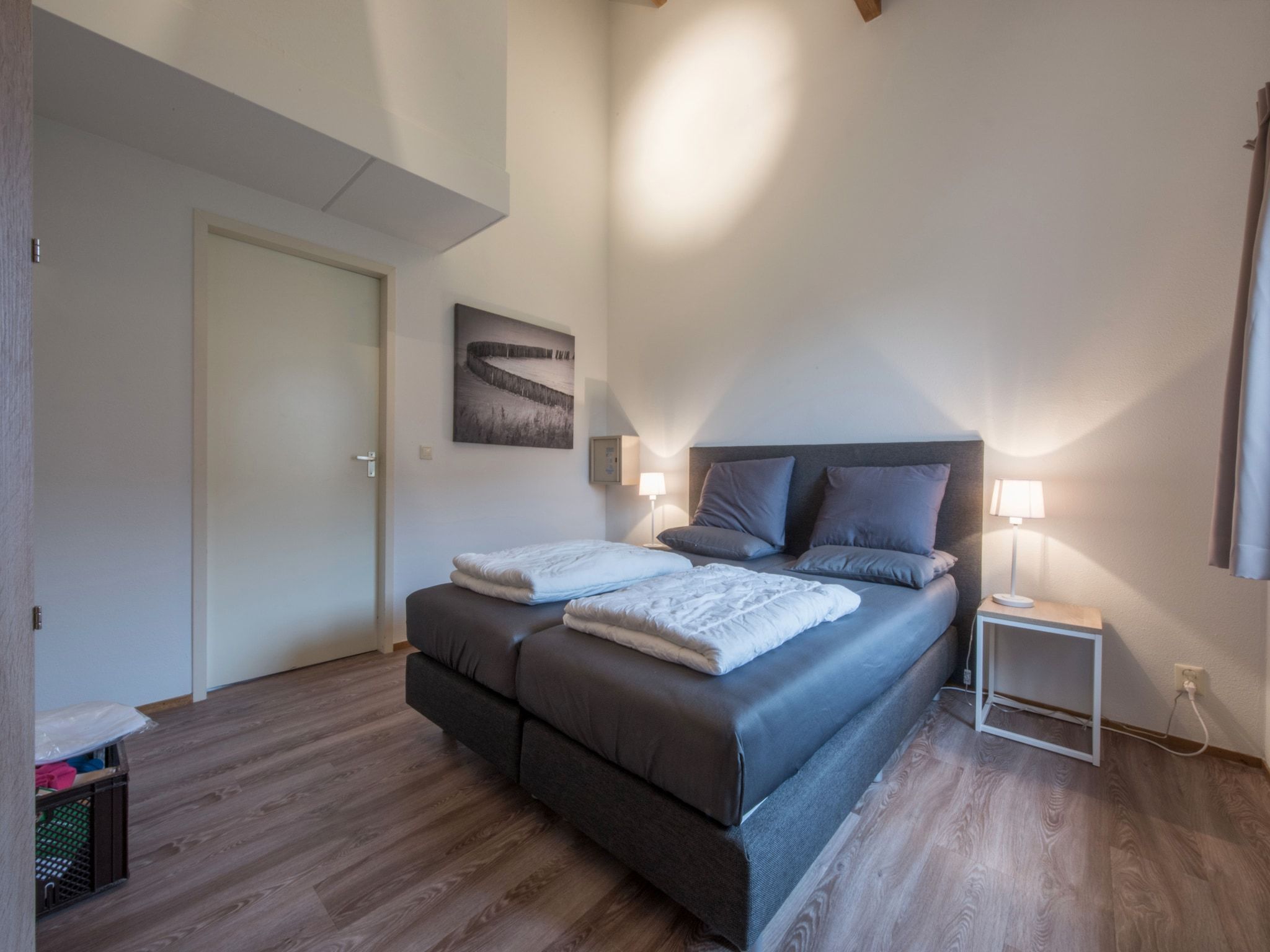Een slaapkamer van Vakantiepark Hof Domburg 24 in Domburg