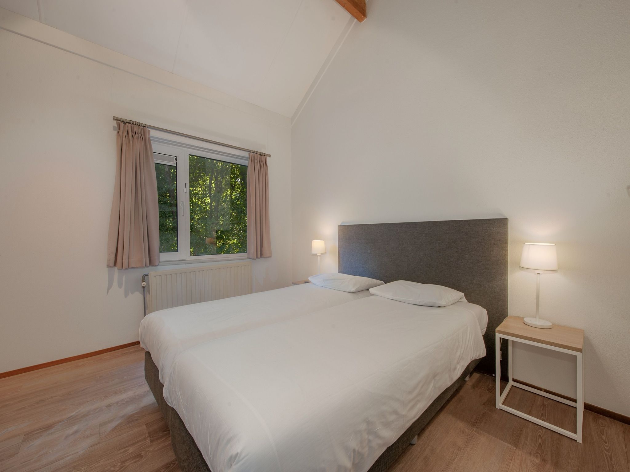 Een slaapkamer van Vakantiepark Hof Domburg 25 in Domburg