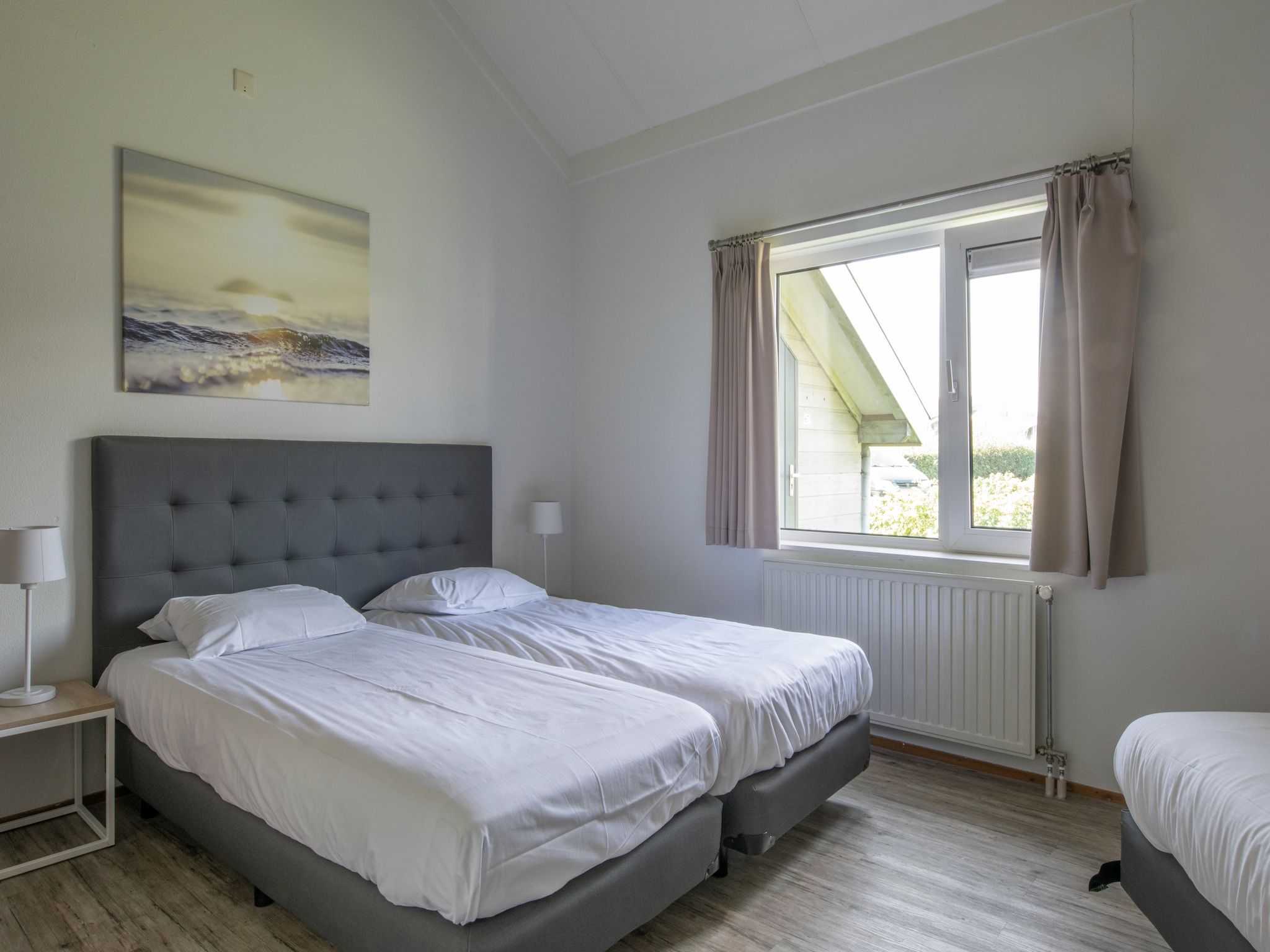 Een slaapkamer van Vakantiepark Hof Domburg 25 in Domburg