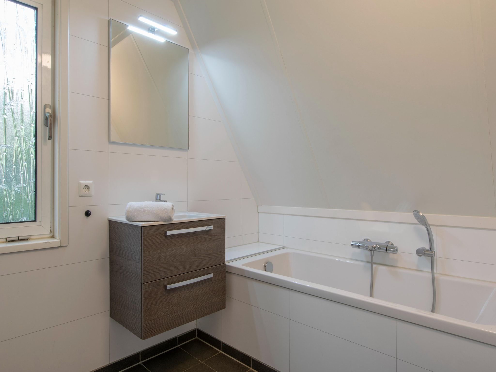 De badkamer van Vakantiepark de Katjeskelder 15 in Oosterhout