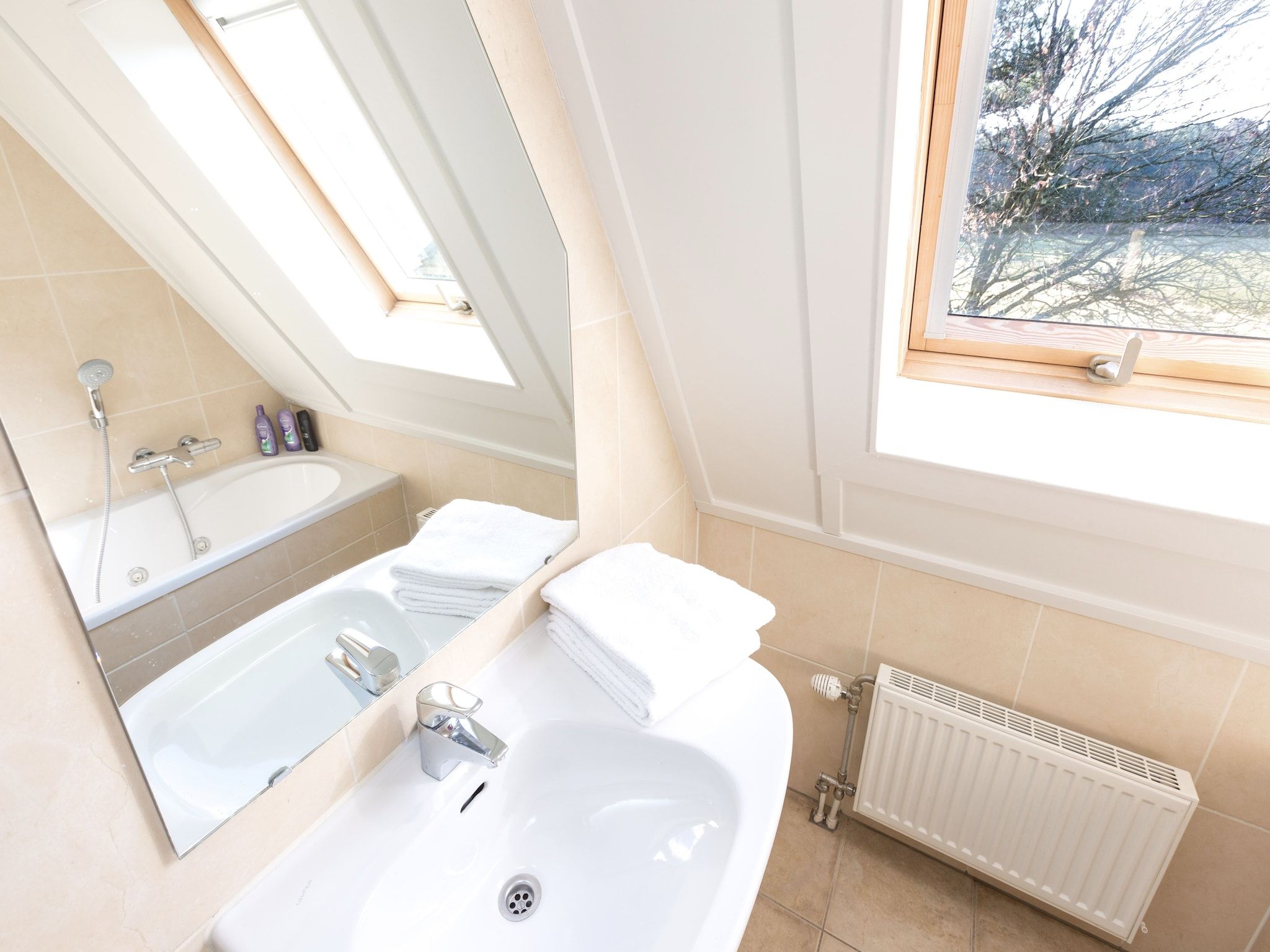 De badkamer van Vakantiepark de Katjeskelder 17 in Oosterhout