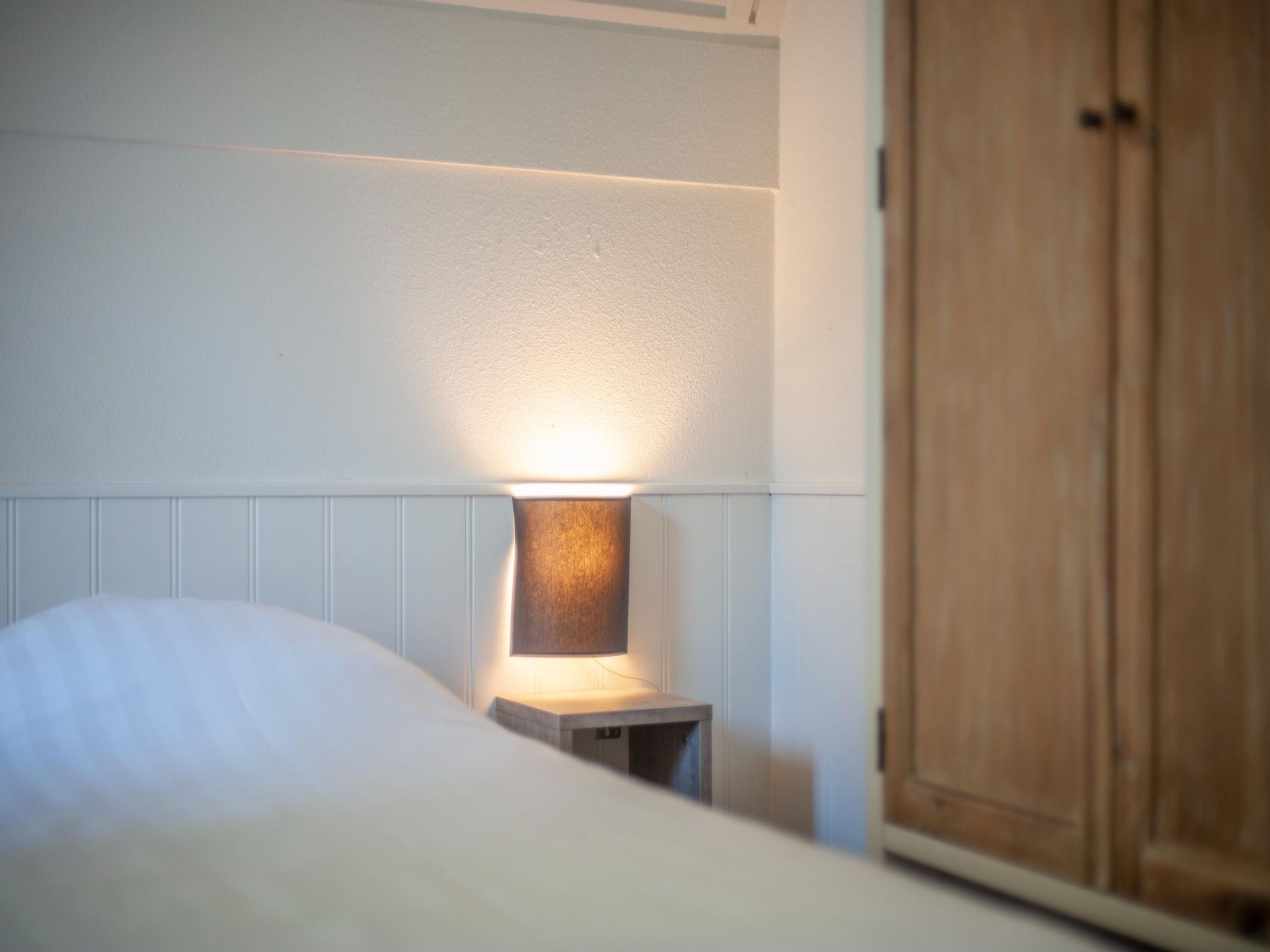 Een slaapkamer van Vakantiepark de Katjeskelder 18 in Oosterhout