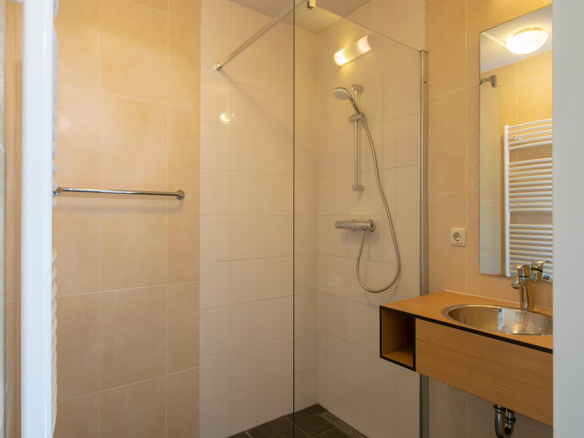 De badkamer van Vakantiepark de Katjeskelder 18 in Oosterhout