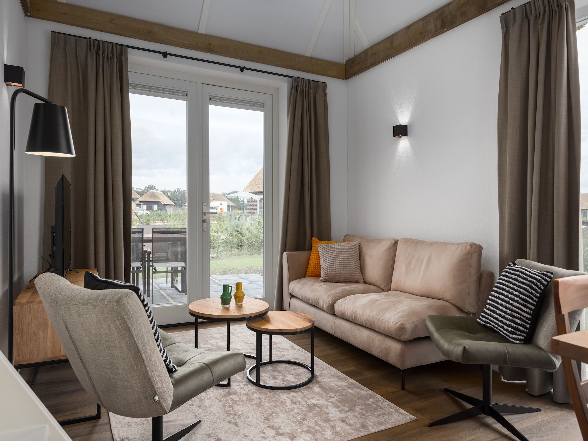 De woonkamer van Vakantiepark De Heihorsten 2 in Someren