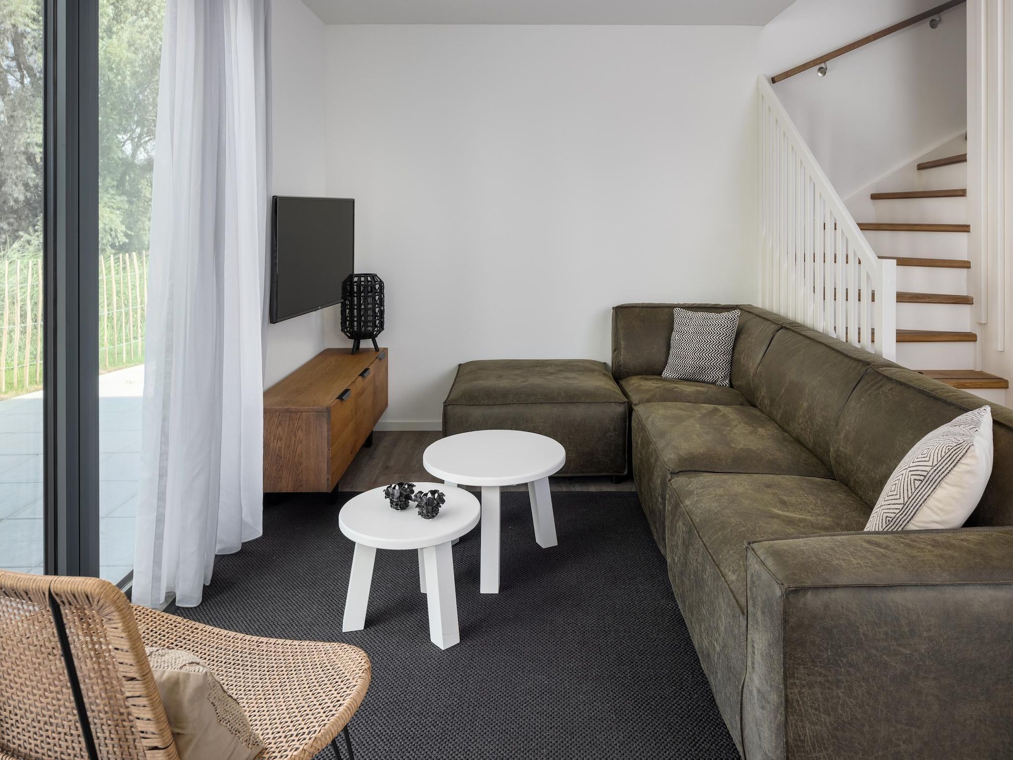 De woonkamer van Park Veerse Kreek 5 in Wolphaartsdijk