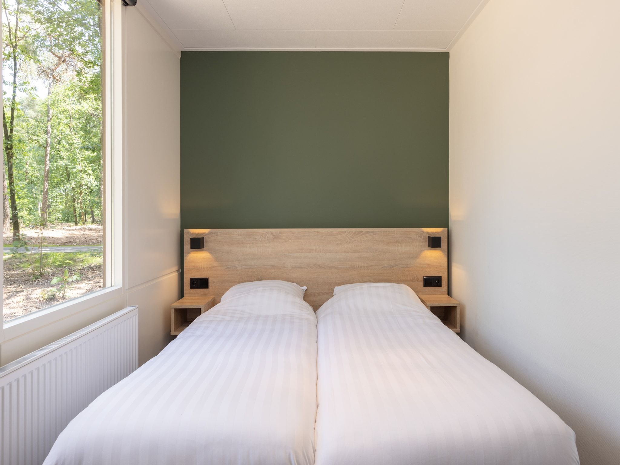 Een slaapkamer van Park De Peel 3 in Vlierden