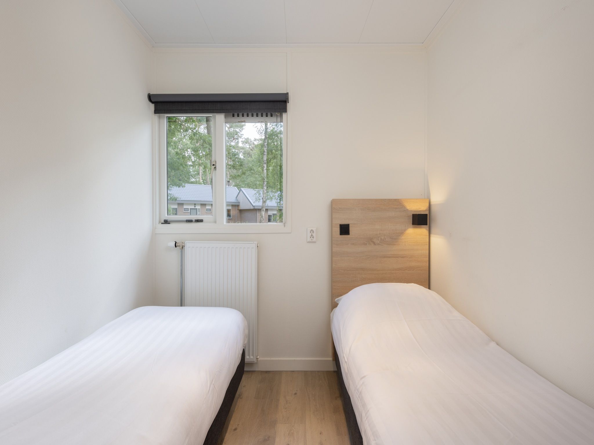 Een slaapkamer van Park De Peel 5 in Vlierden