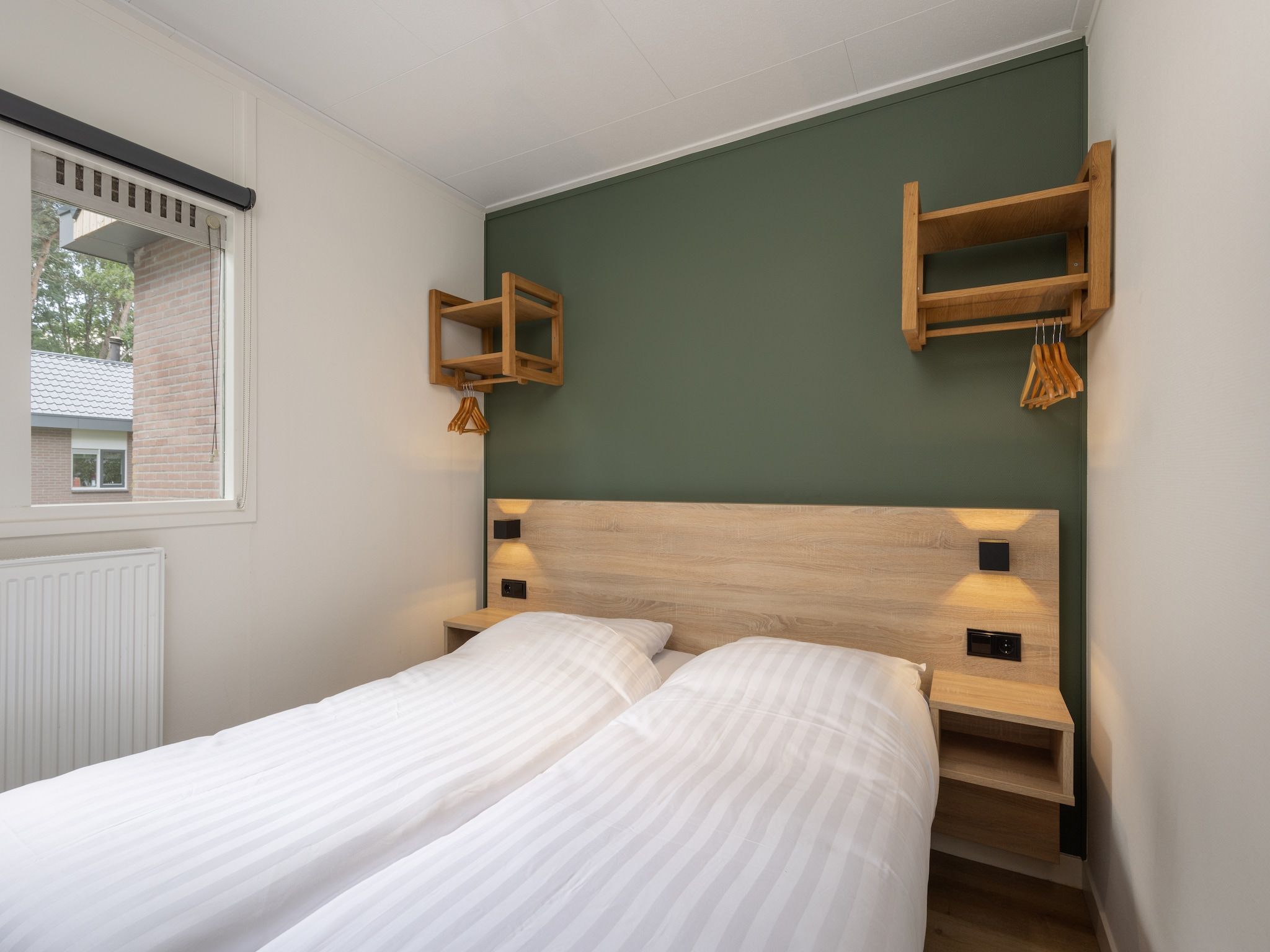 Een slaapkamer van Park De Peel 5 in Vlierden