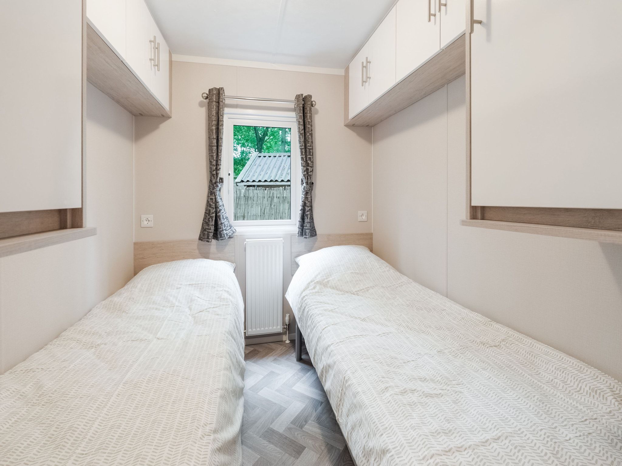 Een slaapkamer van Chalet in Vledder in Vledder