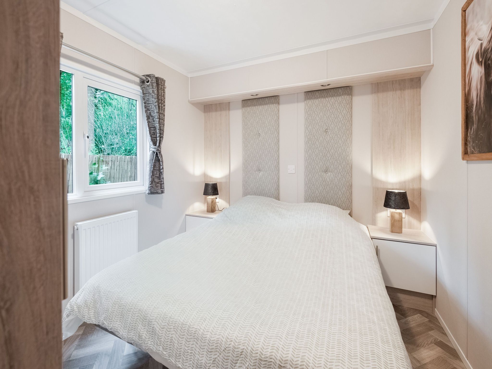 Een slaapkamer van Chalet in Vledder in Vledder