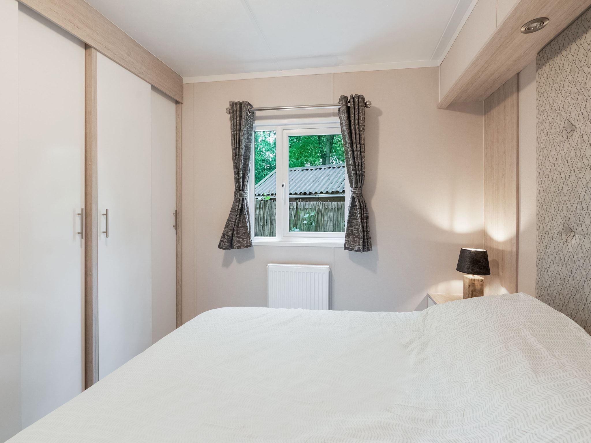 Een slaapkamer van Chalet in Vledder in Vledder