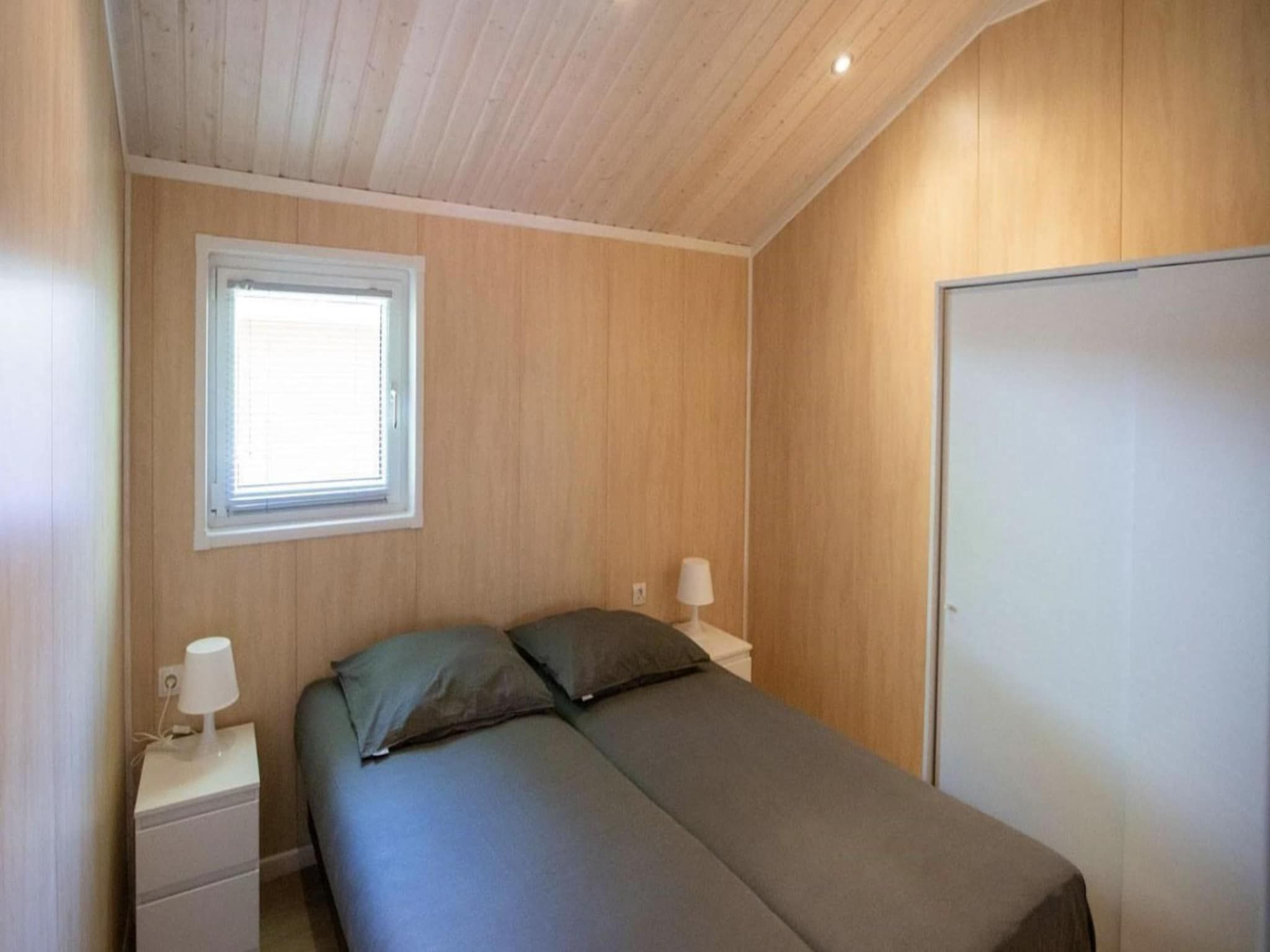 Een slaapkamer van Vakantiepark Latour 3 in Oirschot