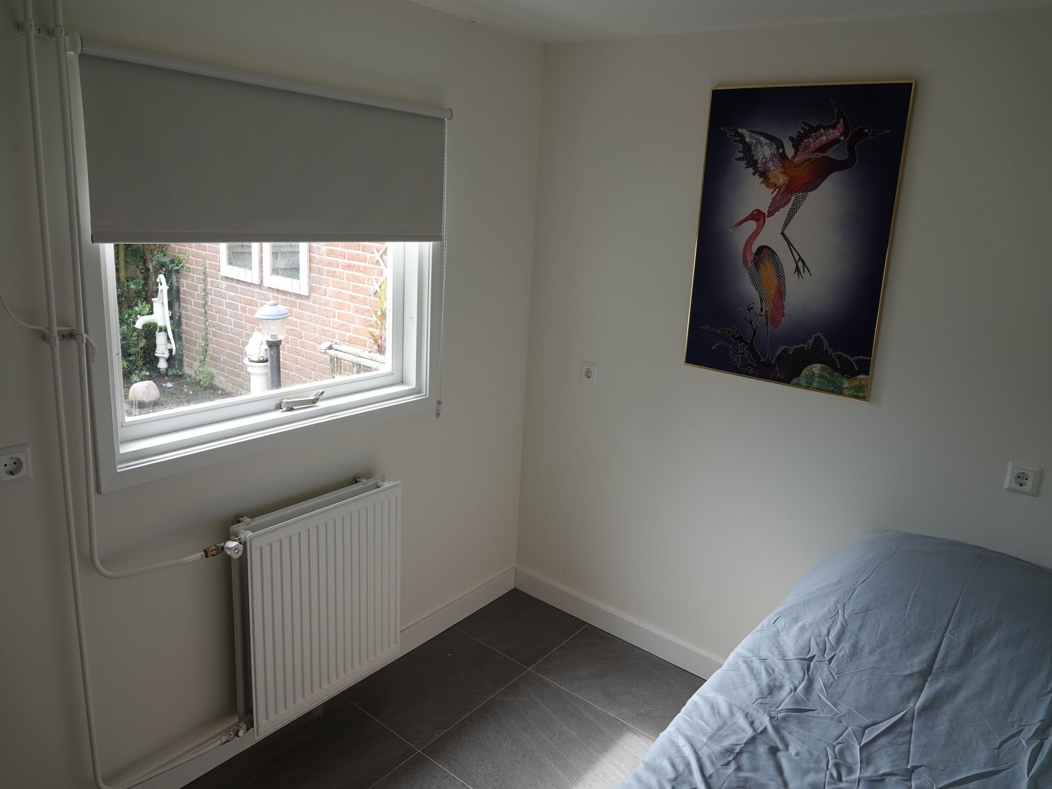 Een slaapkamer van Relaxing Summer in Noordwijkerhout