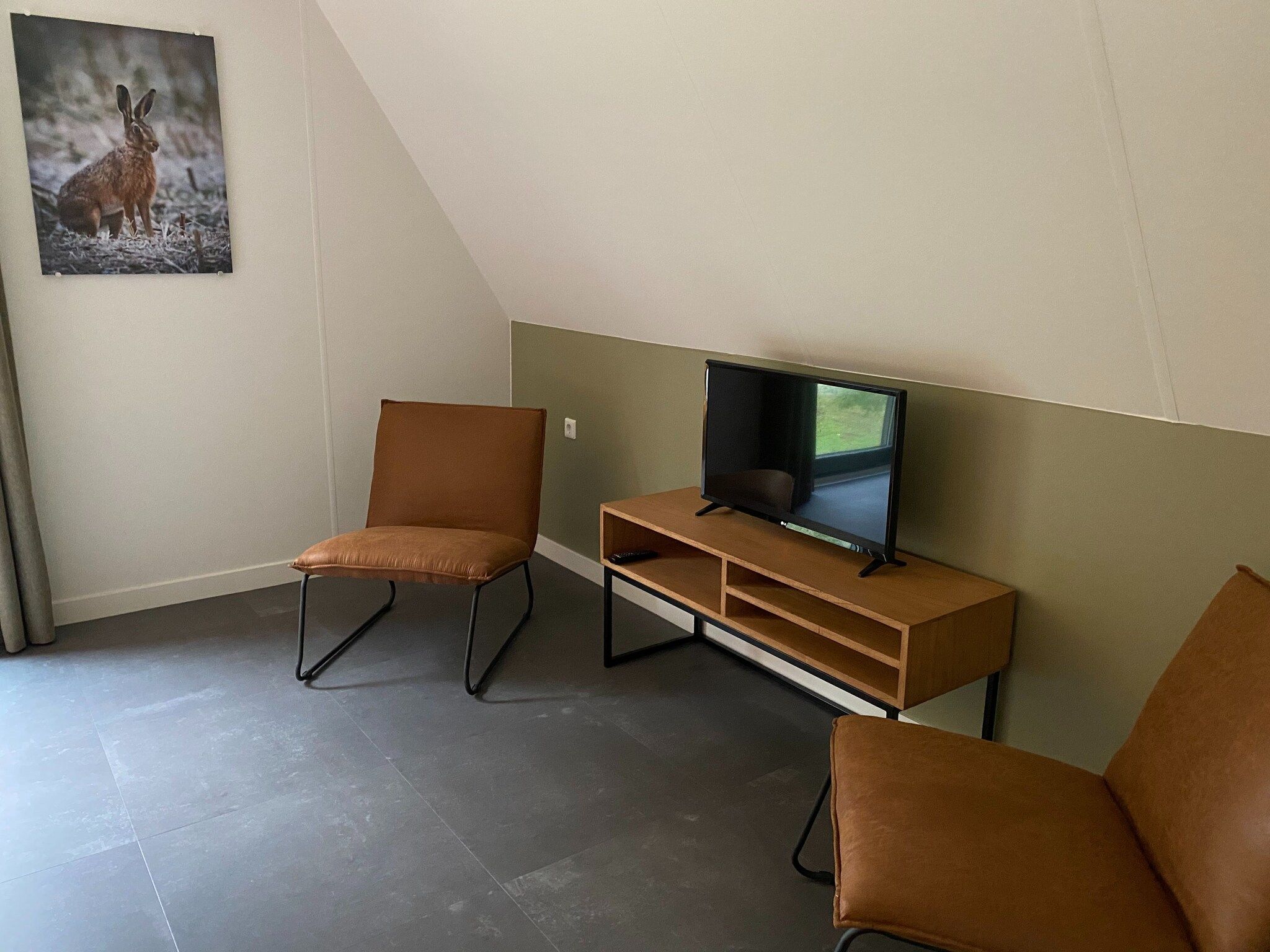 Een slaapkamer van Vakantiepark de Katjeskelder 20 in Oosterhout