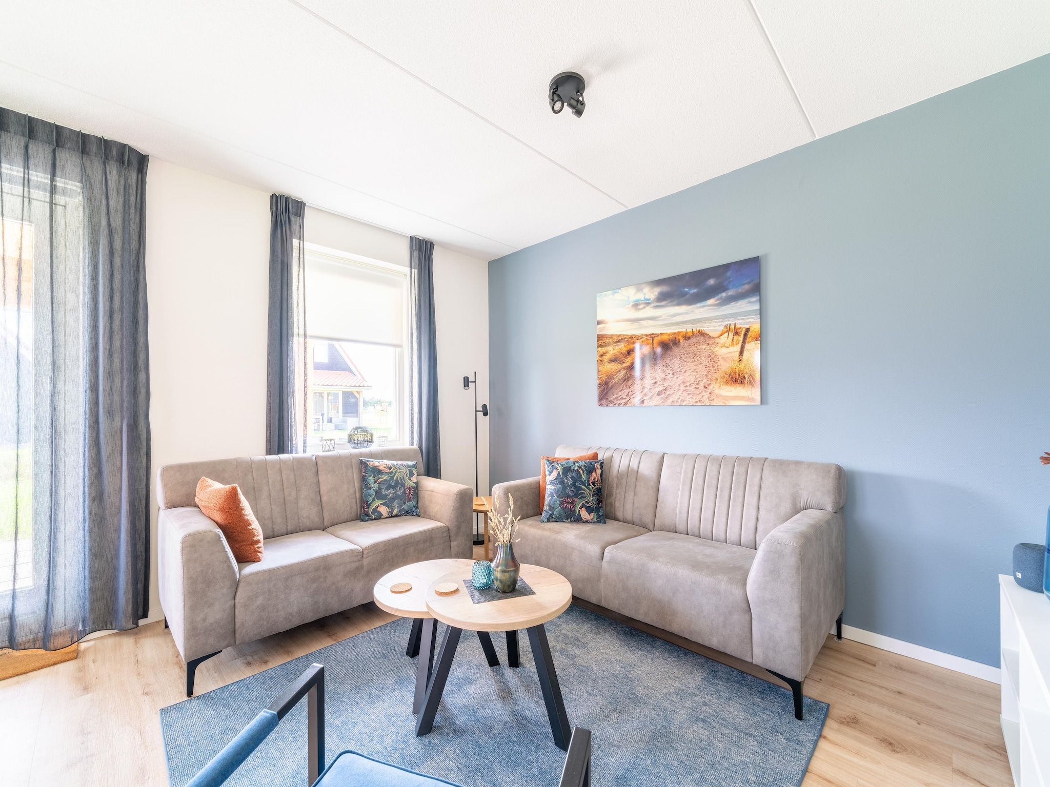 De woonkamer van De Kievit Huis Nr 36 in Scherpenisse