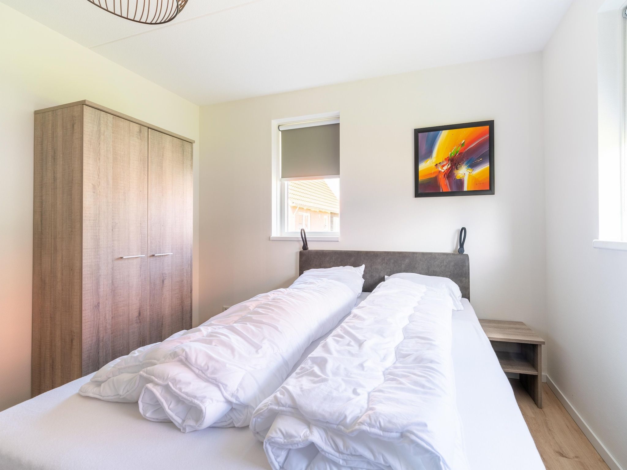 Een slaapkamer van De Kievit Huis Nr 36 in Scherpenisse