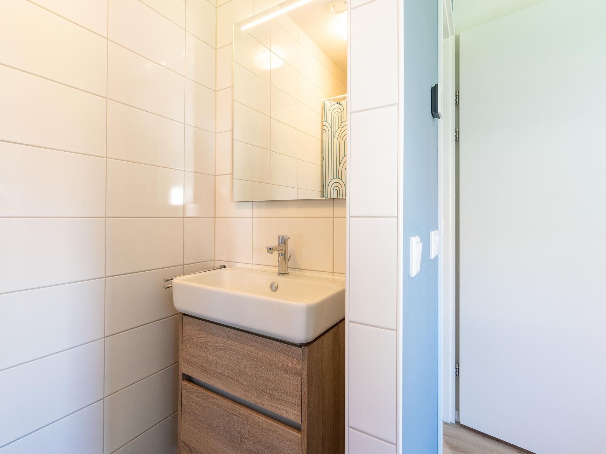 De badkamer van De Kievit Huis Nr 36 in Scherpenisse