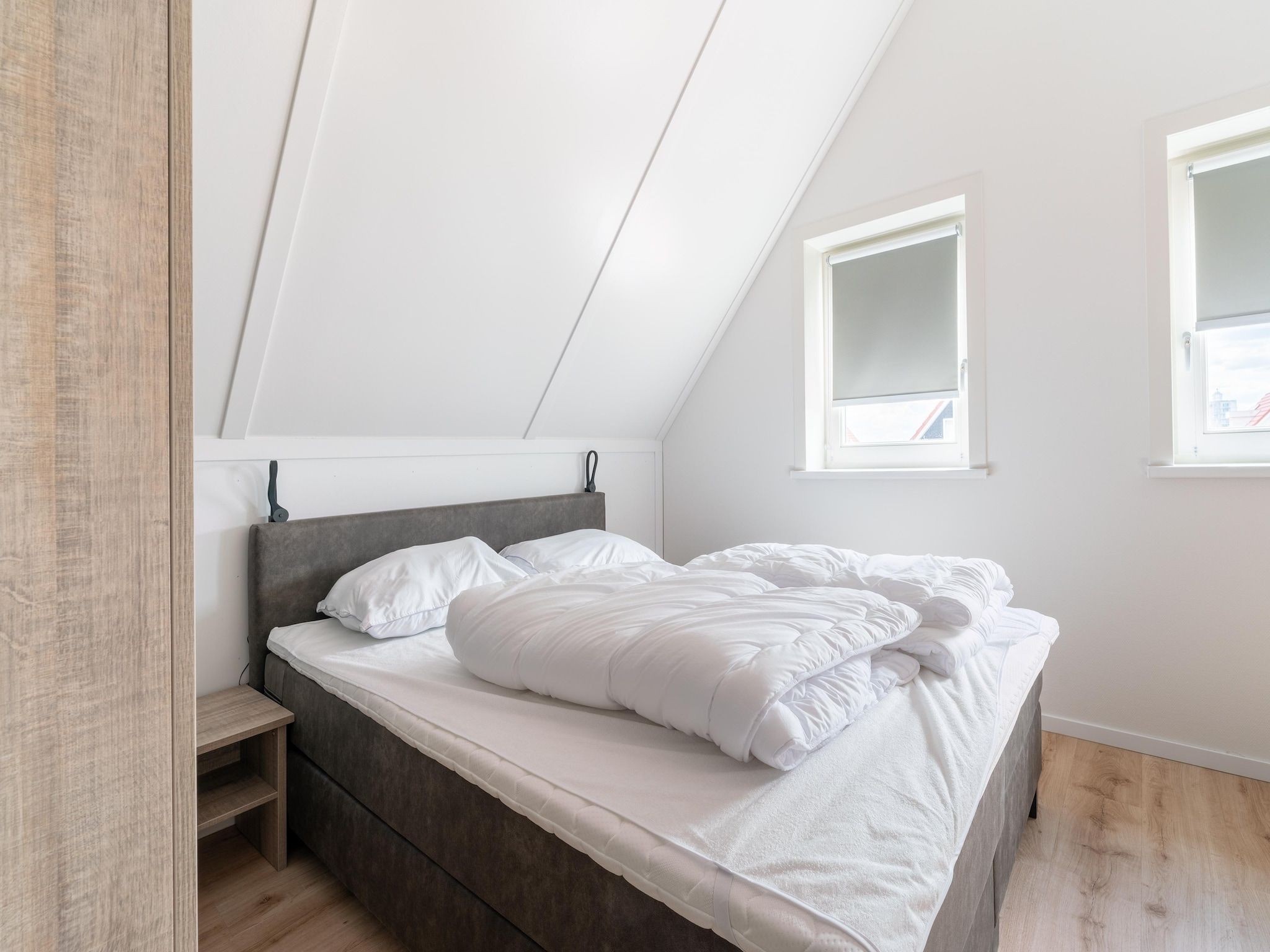 Een slaapkamer van De Kievit Huis Nr 36 in Scherpenisse