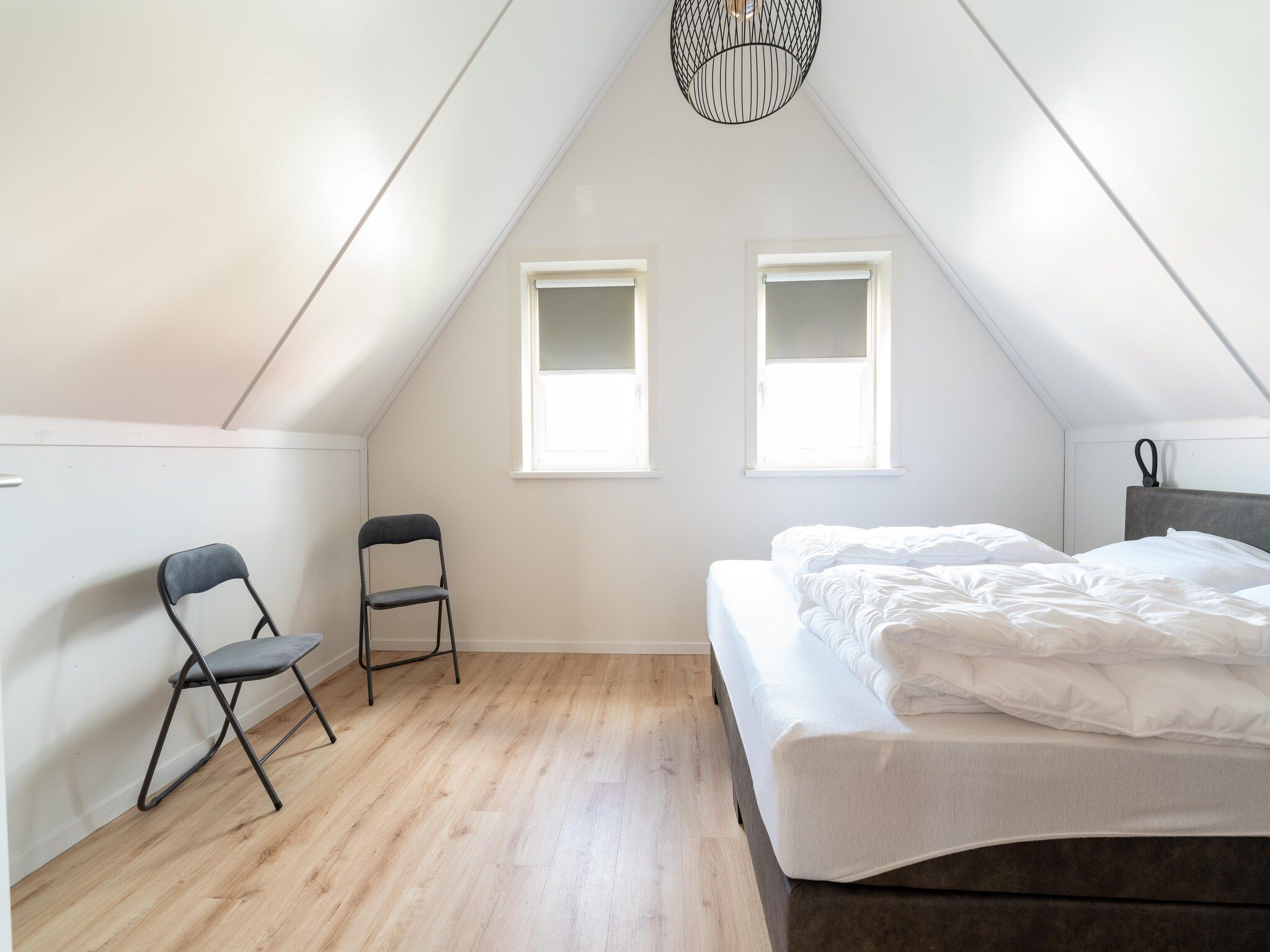 Een slaapkamer van De Kievit Huis Nr 36 in Scherpenisse