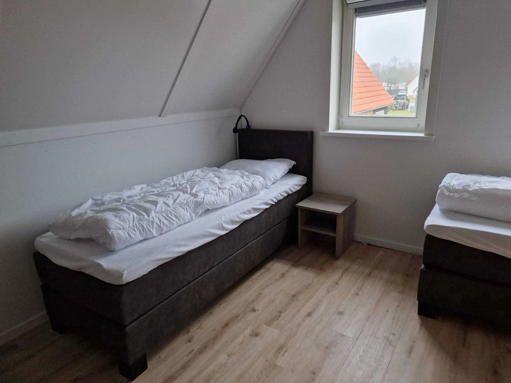 Een slaapkamer van De Kievit Huis Nr 36 in Scherpenisse