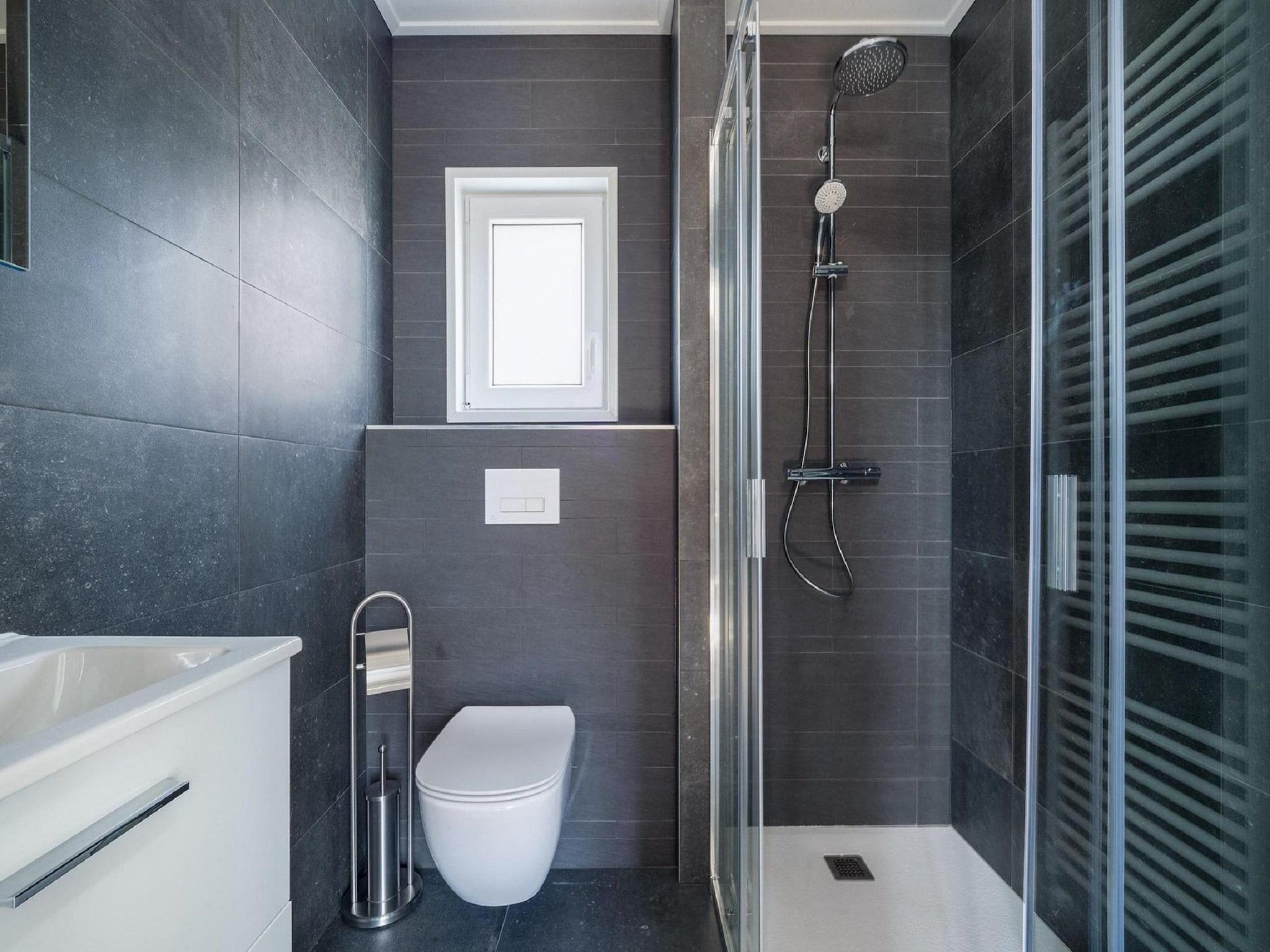 De badkamer van Vakantiepark De Rimboe & De Woeste Hoogte 24 in Hoenderloo